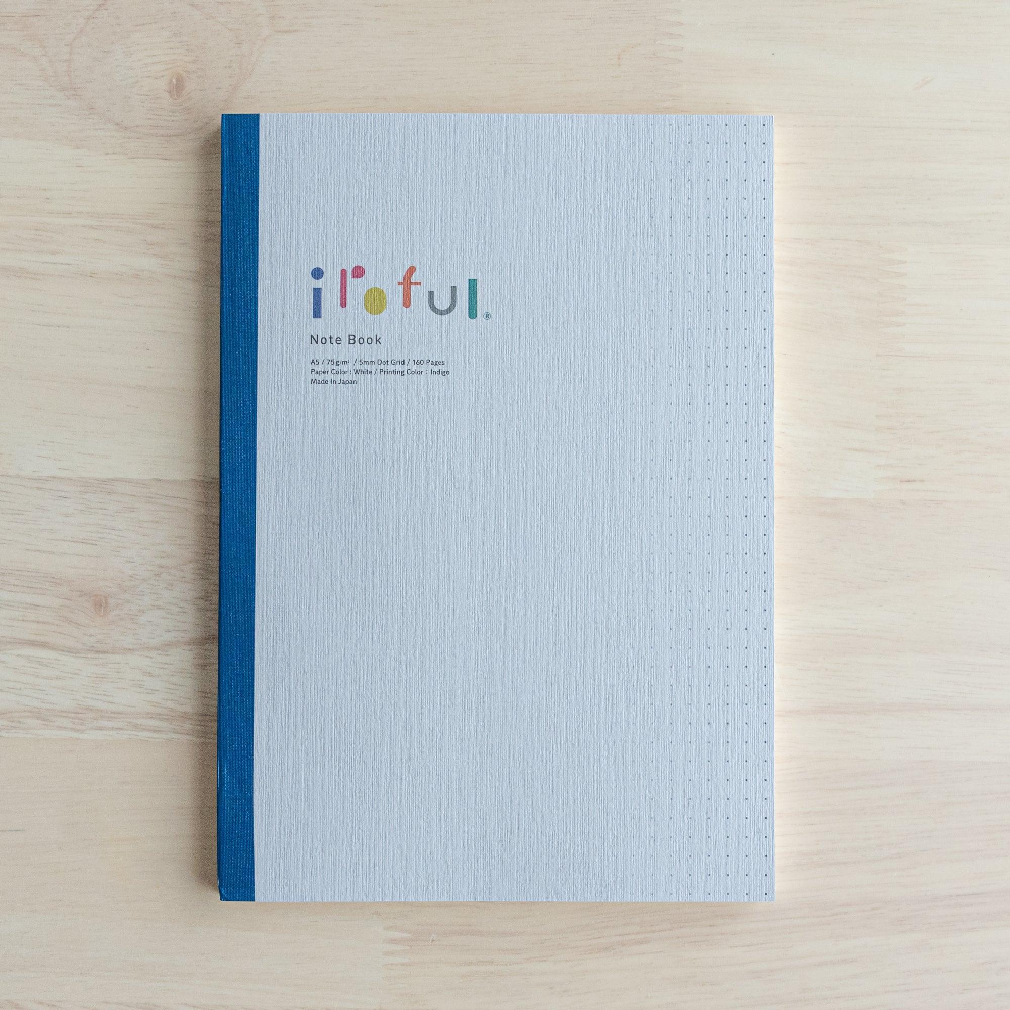 Iroful indigo A5 with quality binding, overhead flat lay product shot with neutral composition background