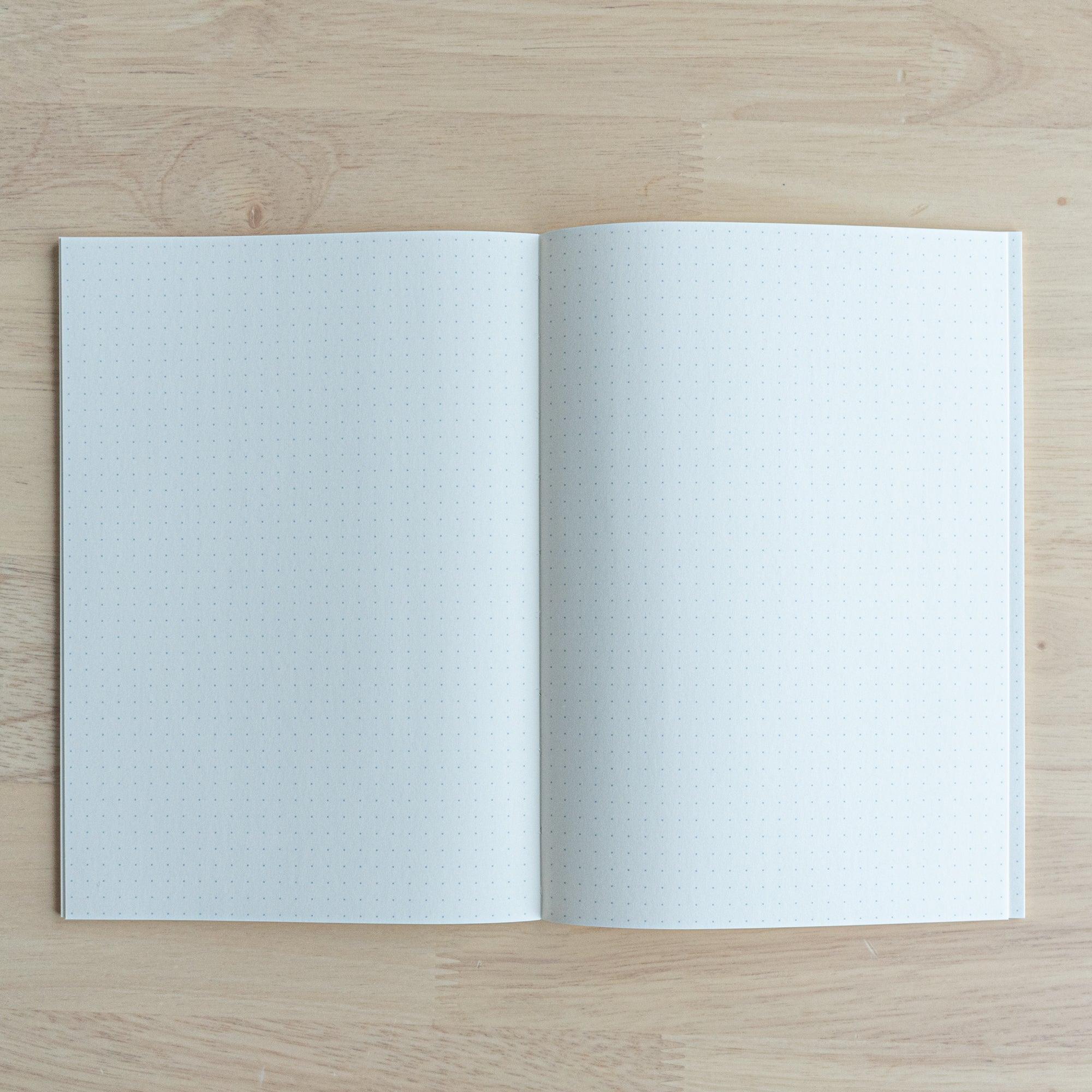 Iroful Japanese indigo A5 journal, fully opened display of paper texture and quality with indigo cover