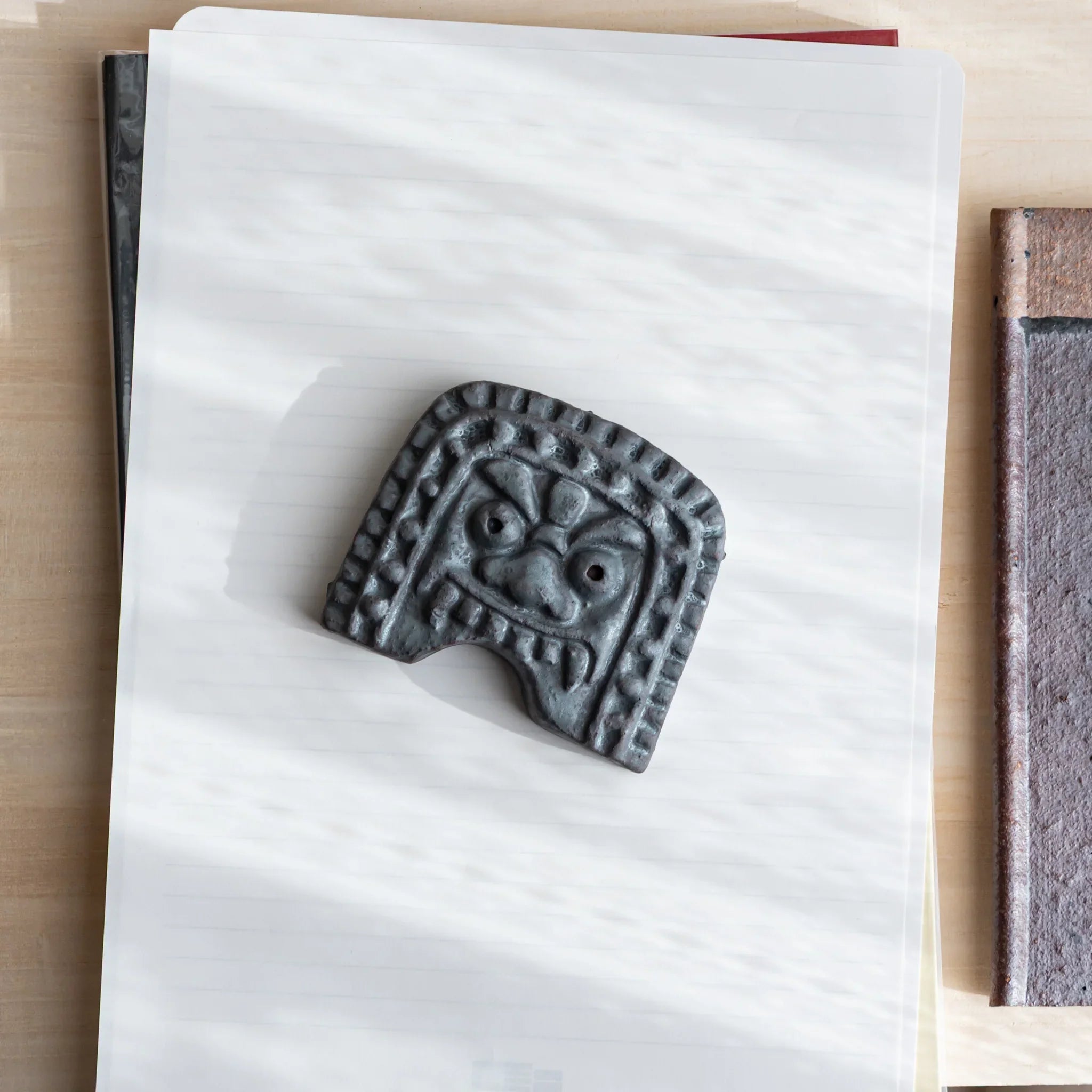 Japanese Kawara Roof Guardian Paperweight Medium square face three-quarter view showing complete form