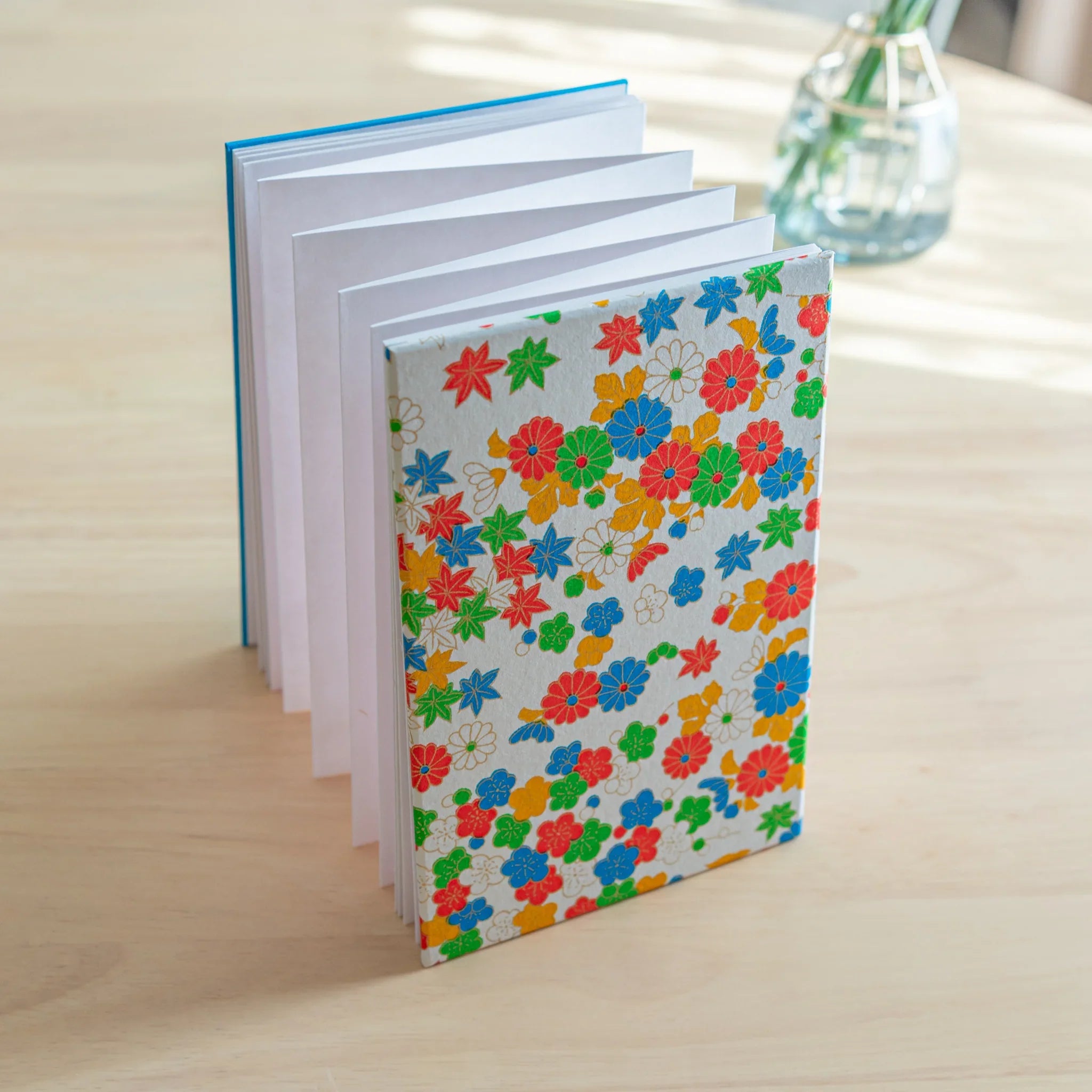 Joyful Flowers Washi Goshuincho Stamp Book opened showing interior pages of white washi paper ready for stamps