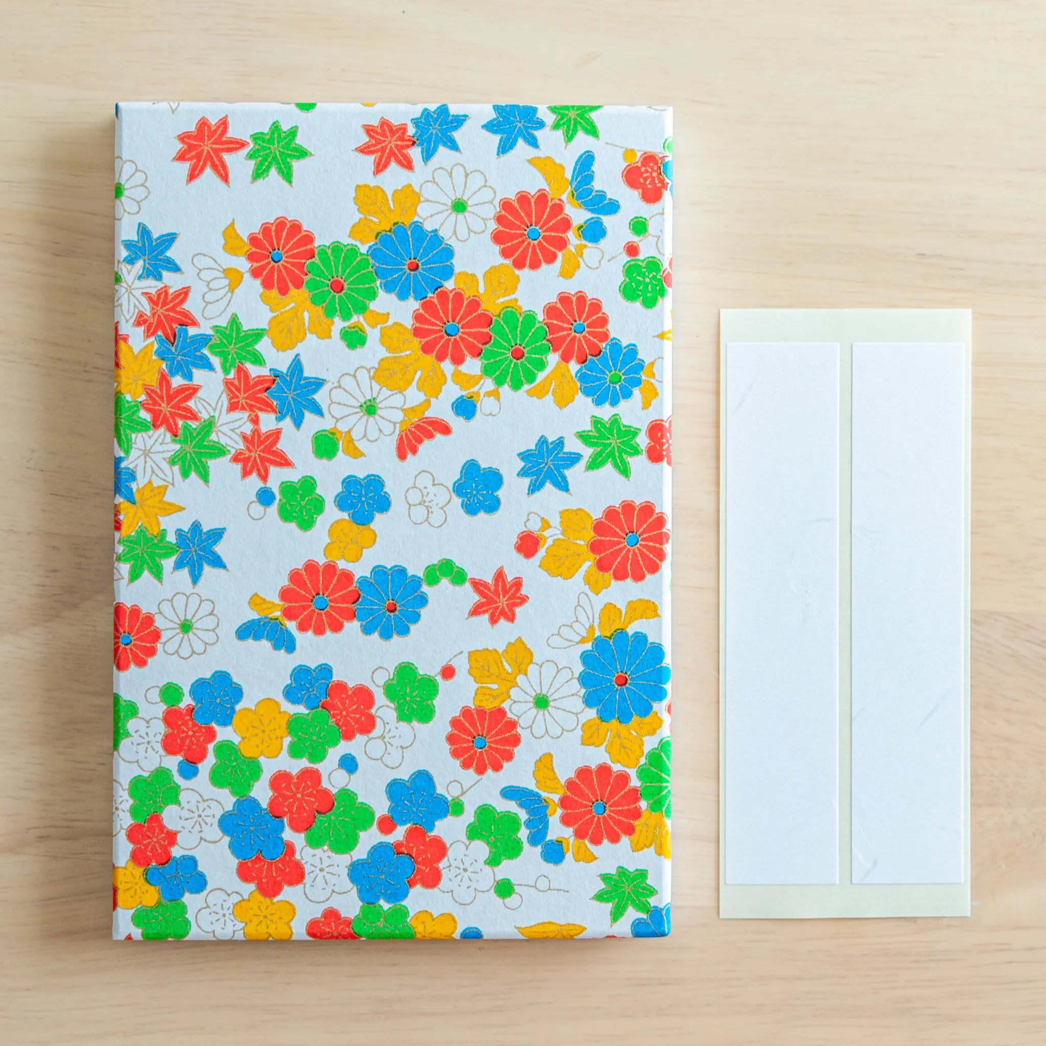 Joyful Flowers Washi Goshuincho Stamp Book overhead view showing cover design with vibrant flower pattern