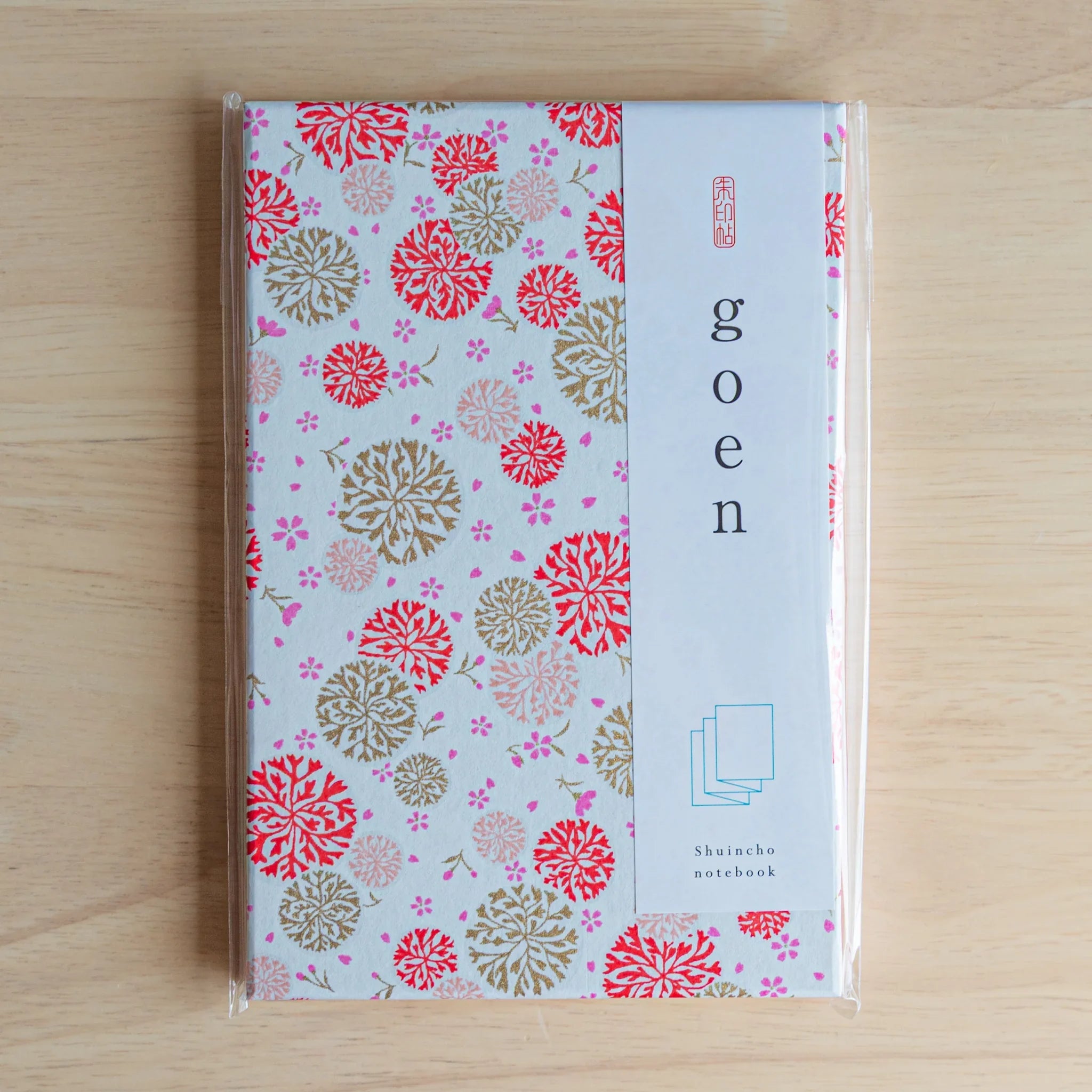 Kikka Harmony Washi Goshuincho Stamp Book Red showing close-up detail of red flowers and leaf designs