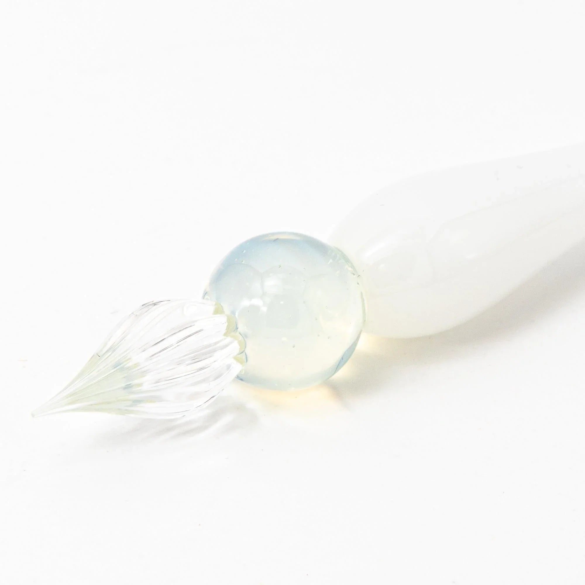white glass writing pen features regal scepter form with hand-blown glass artistry pen hand-made