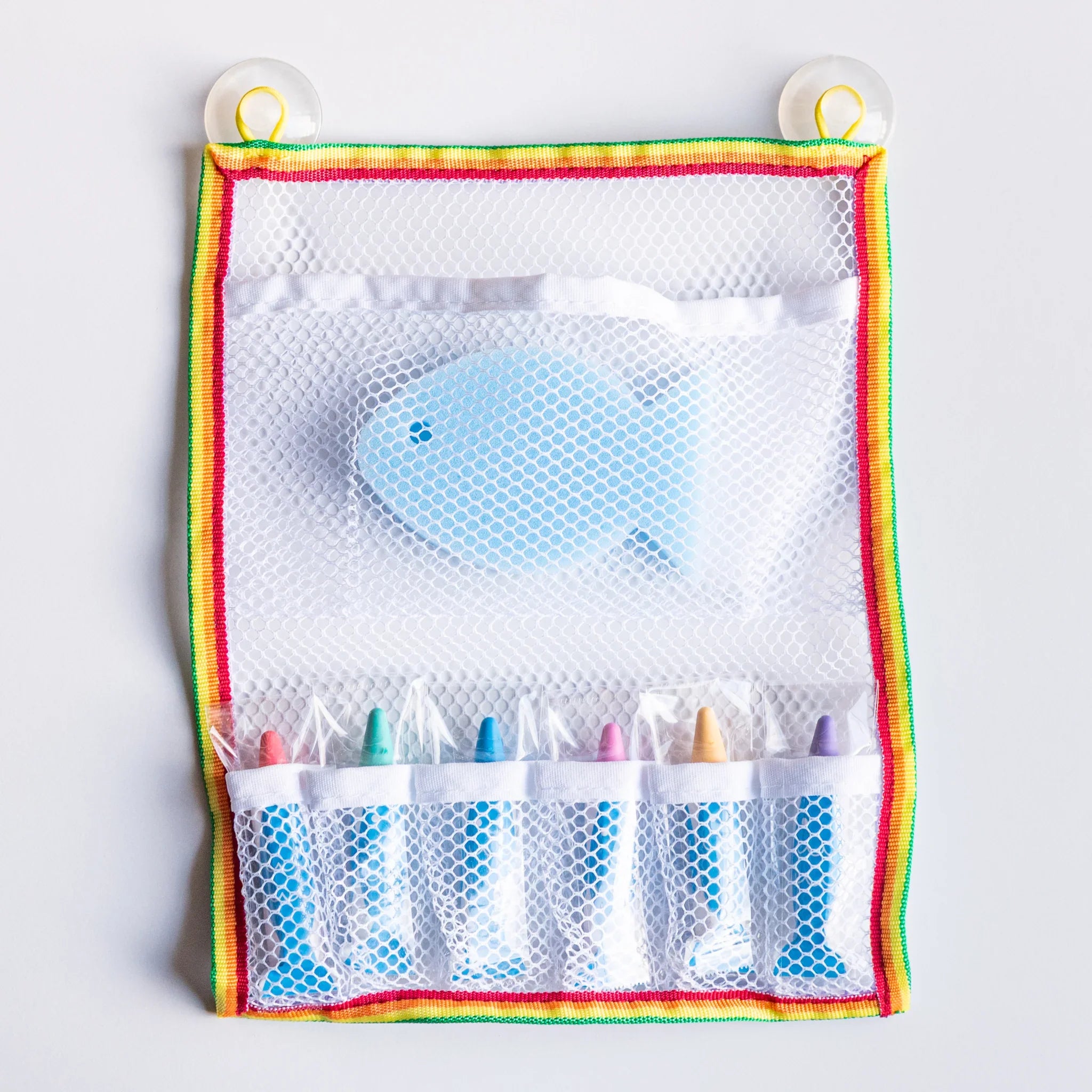 Blue mesh cleaning net with sponge shown displaying bath play features and features and features and features