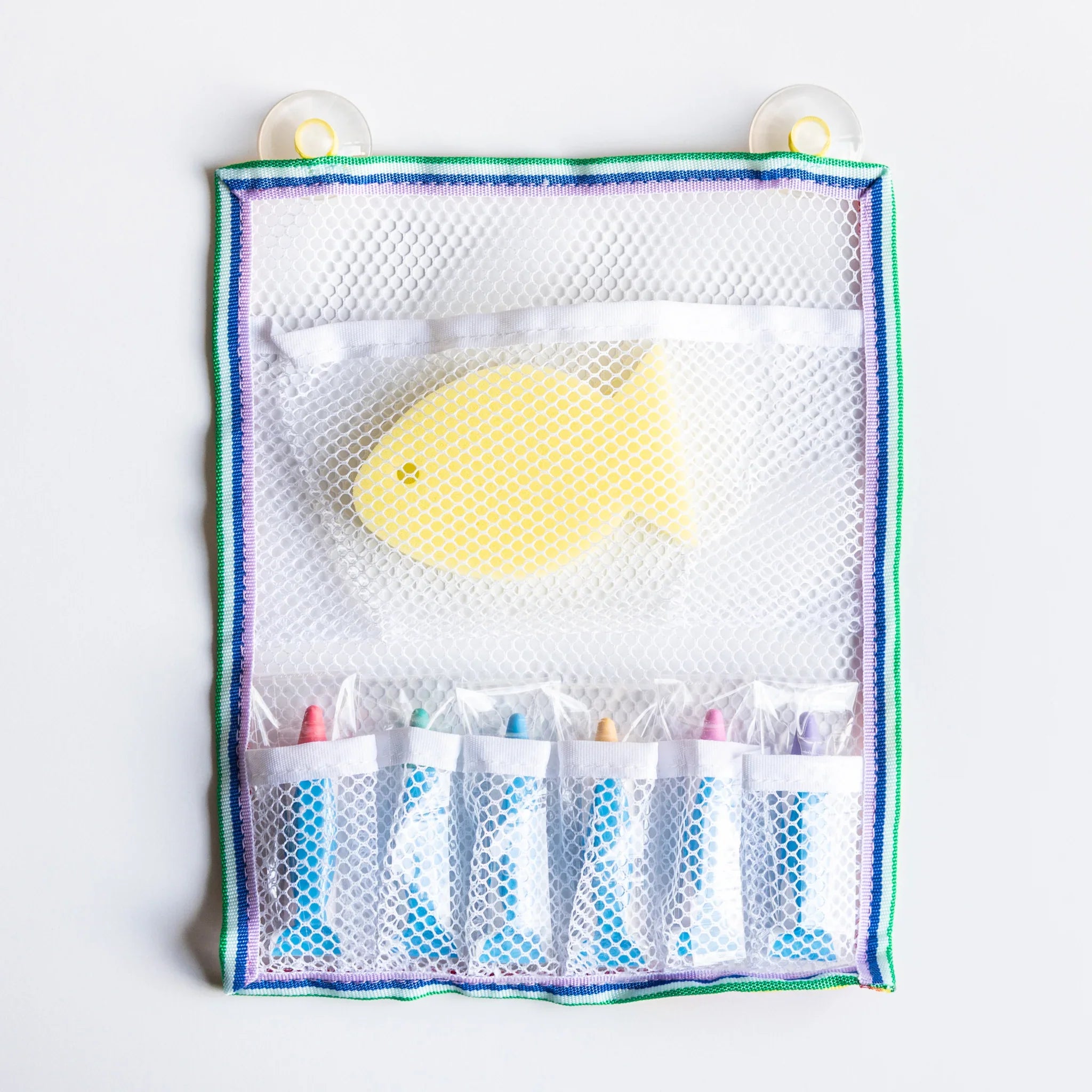 Watercolor crayons with yellow cleaning net displayed showing product pairing and features and features