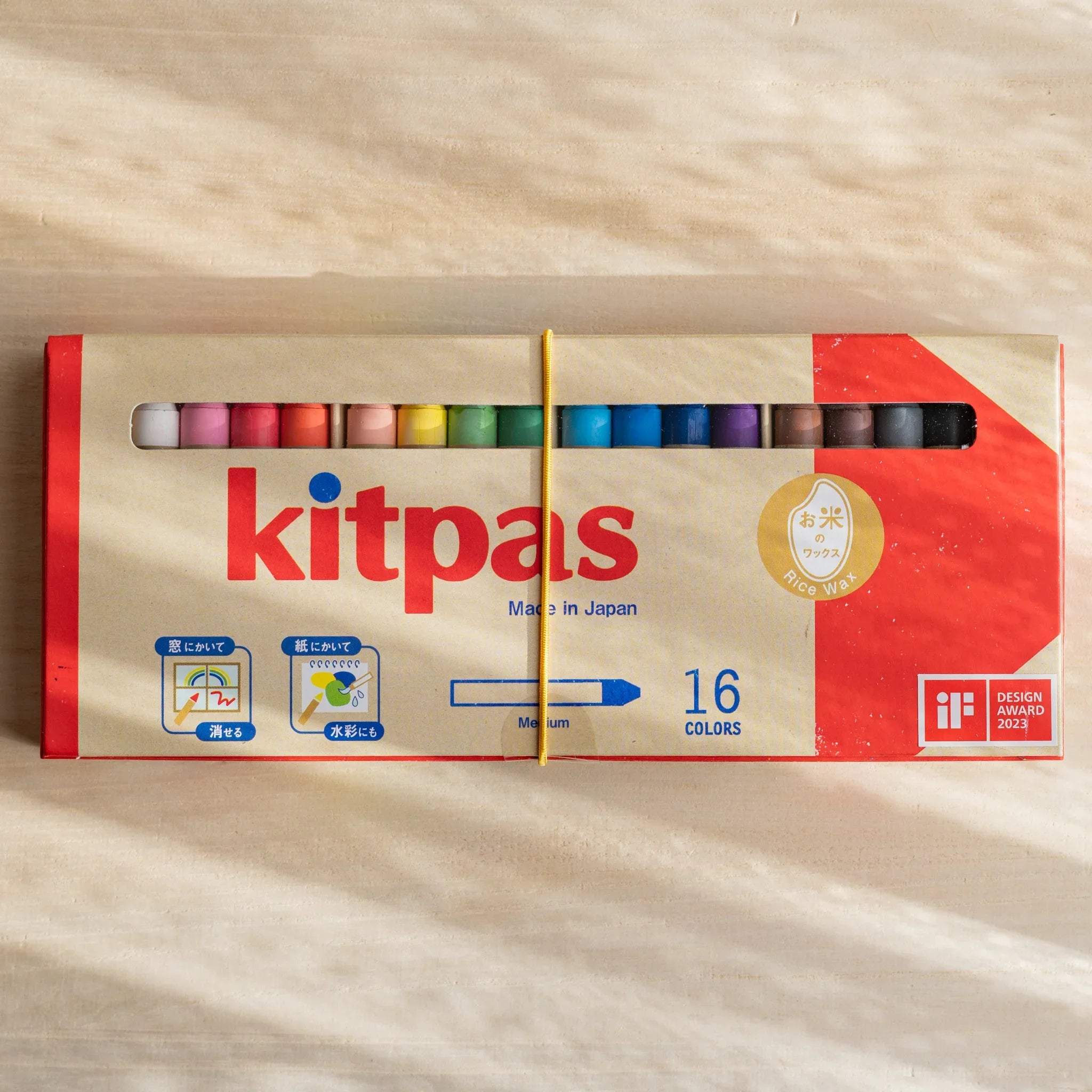 Kitpas Little Artist watercolor crayon set displayed with linen storage bag showing all 16 colored crayons