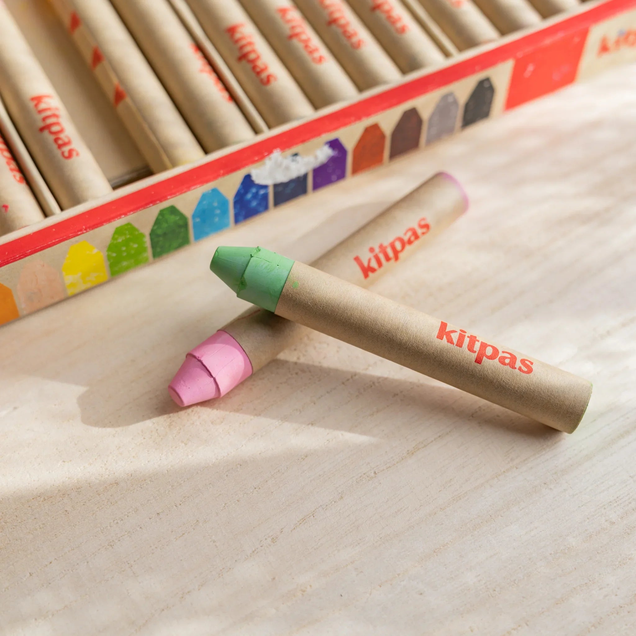 Kitpas crayons close-up showing individual stick details and the smooth finish of each crayon type sticks