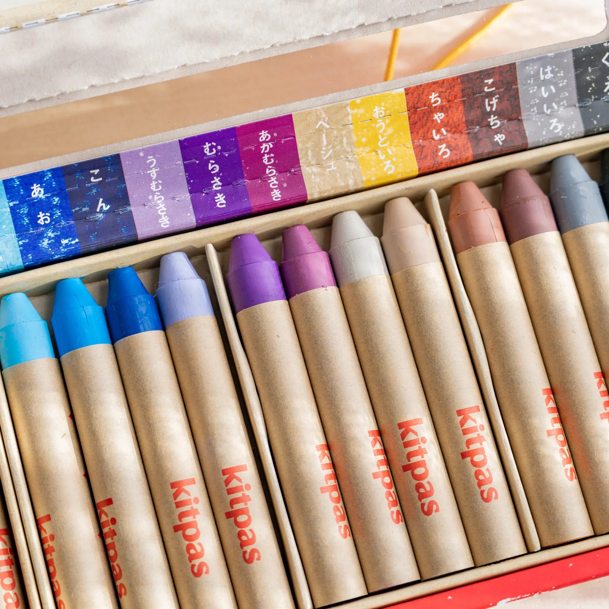 Kitpas Non-Toxic Rice Wax Watercolor Crayons 24-color set three-quarter angle view of large crayon box