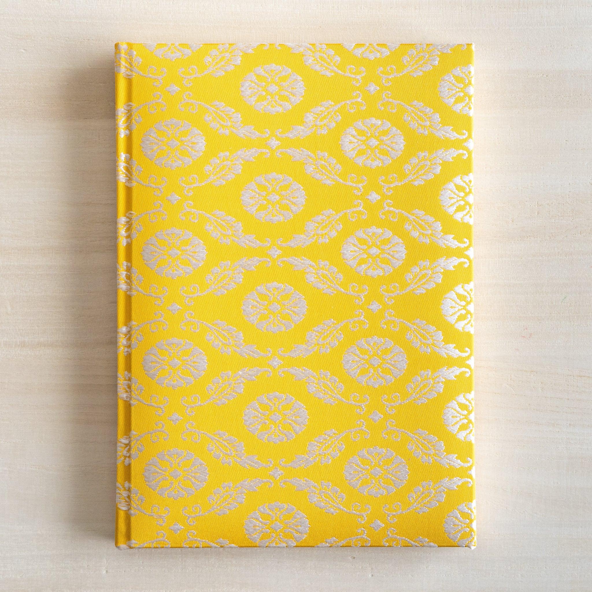 Ko Aoi Nishijin silk Homeicho notebook straight-on front cover without paper band showing full golden Ko Aoi floral pattern