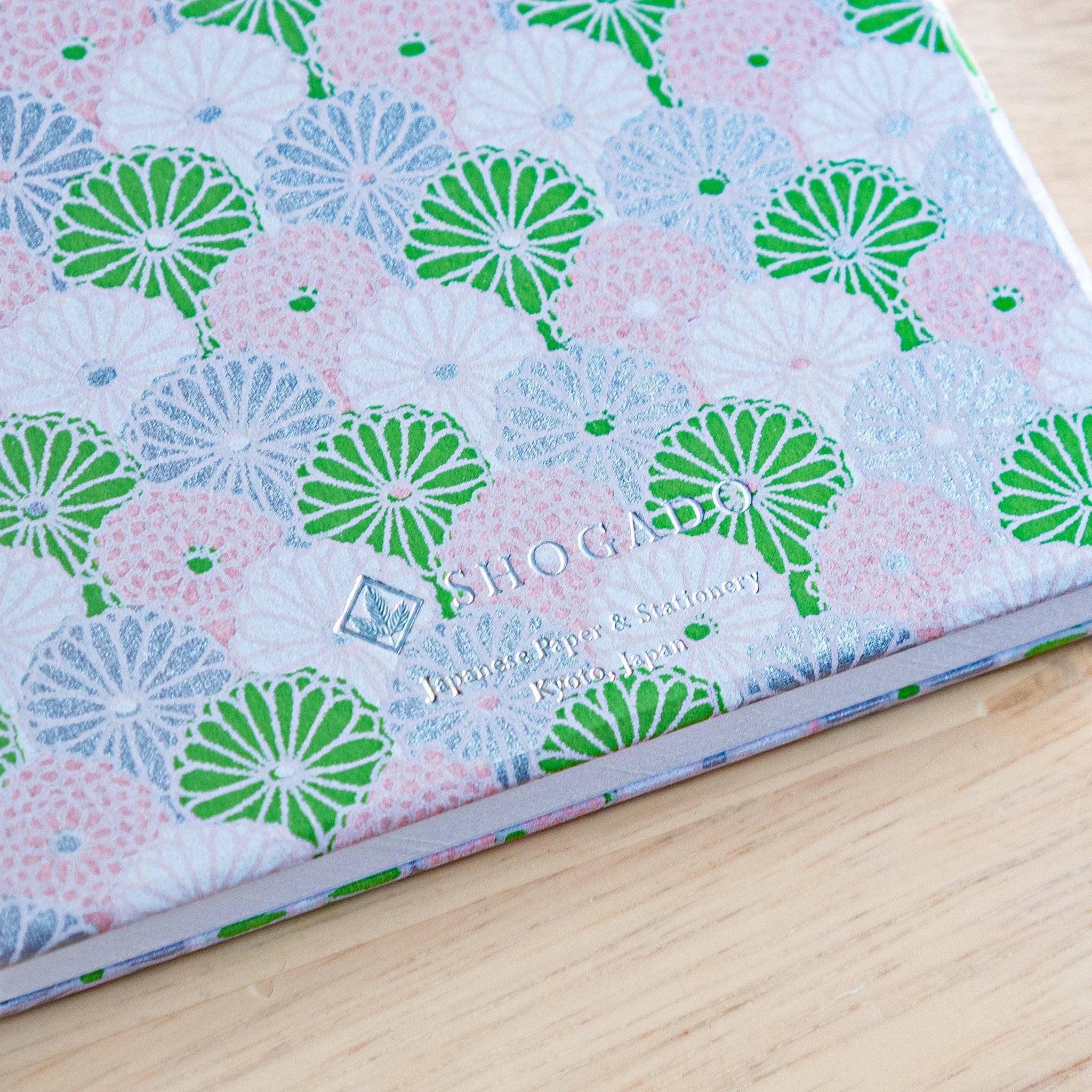 Lavender Mist Chrysanthemum Goshuincho detail showing soft pastel cover with purple-pink flower design and washi texture