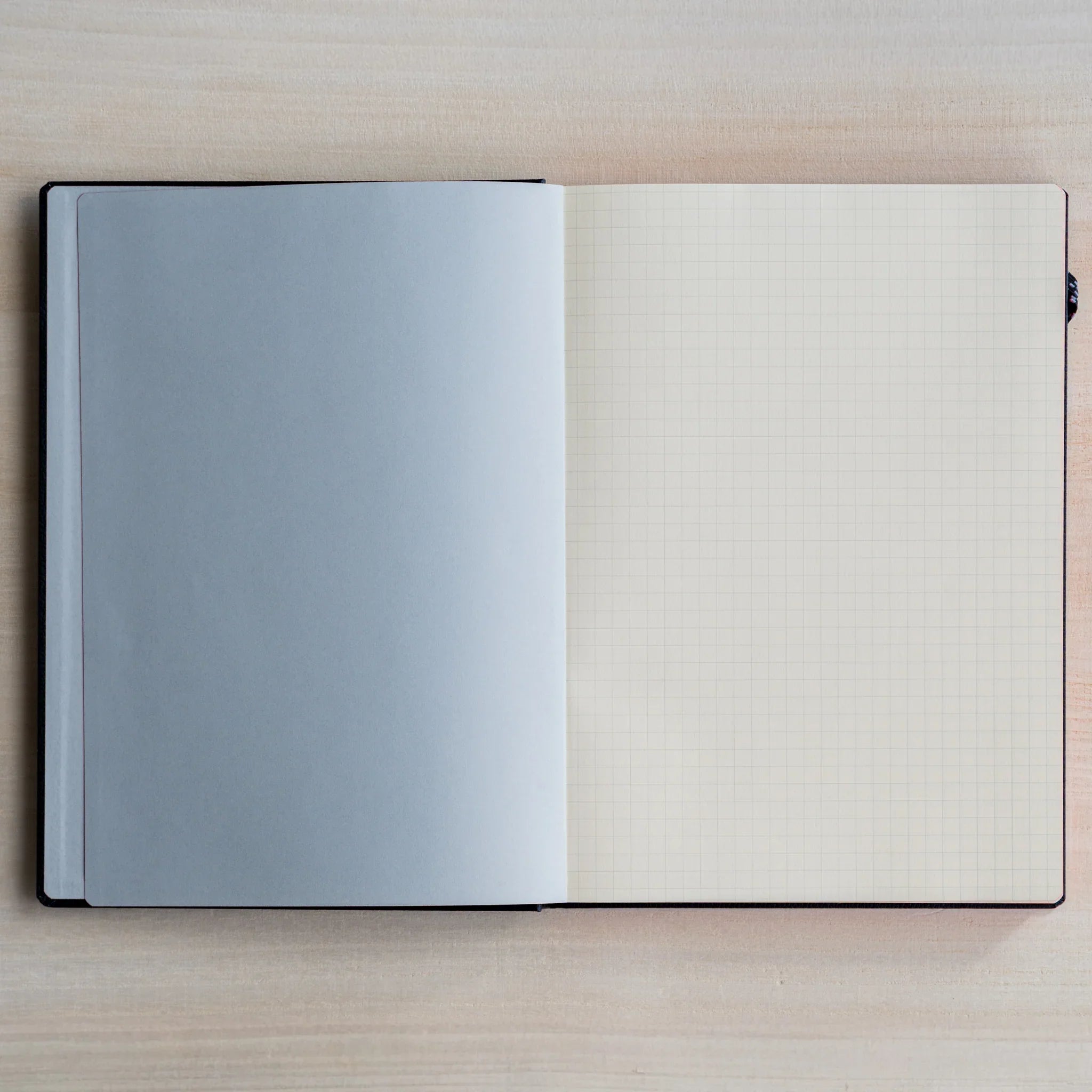 Life Noble A5 hardcover notebook featuring materials, angled view showing highlighting closure mechanism