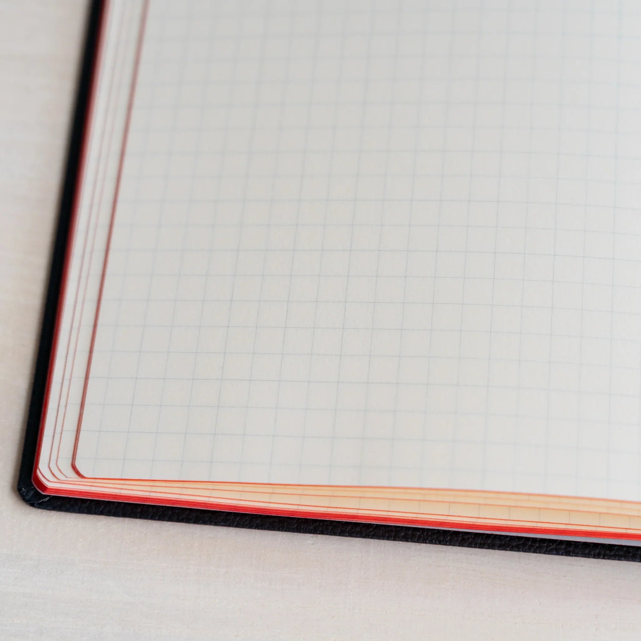 Life Noble A5 notebook, angled view showing quality materials with closure mechanism, LIFE Japan A5 hardcover notebook with c