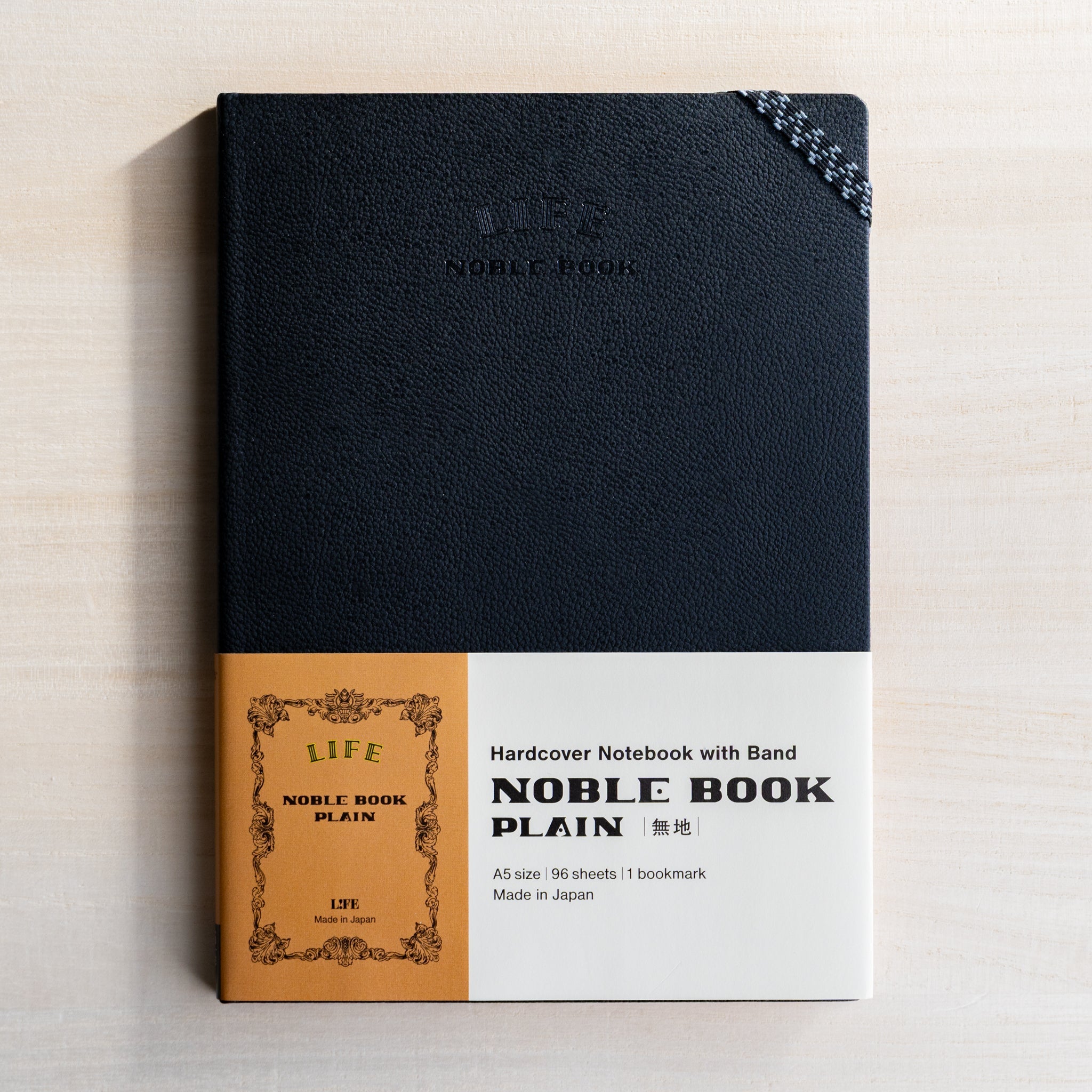 Stacked Life Noble notebooks A5 hard cover in various colors, showcasing Japanese craftsmanship and quality