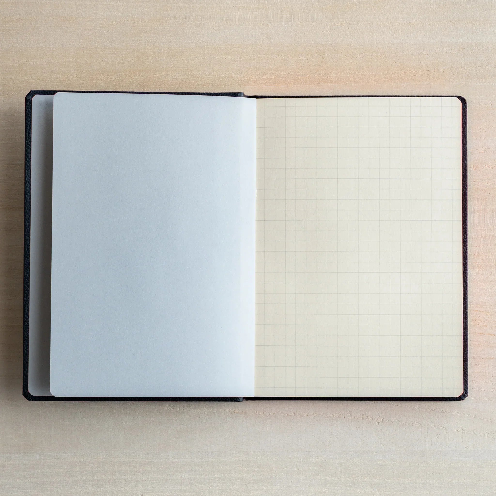 Life Noble A6 hardcover notebook featuring materials, angled view showing highlighting closure mechanism