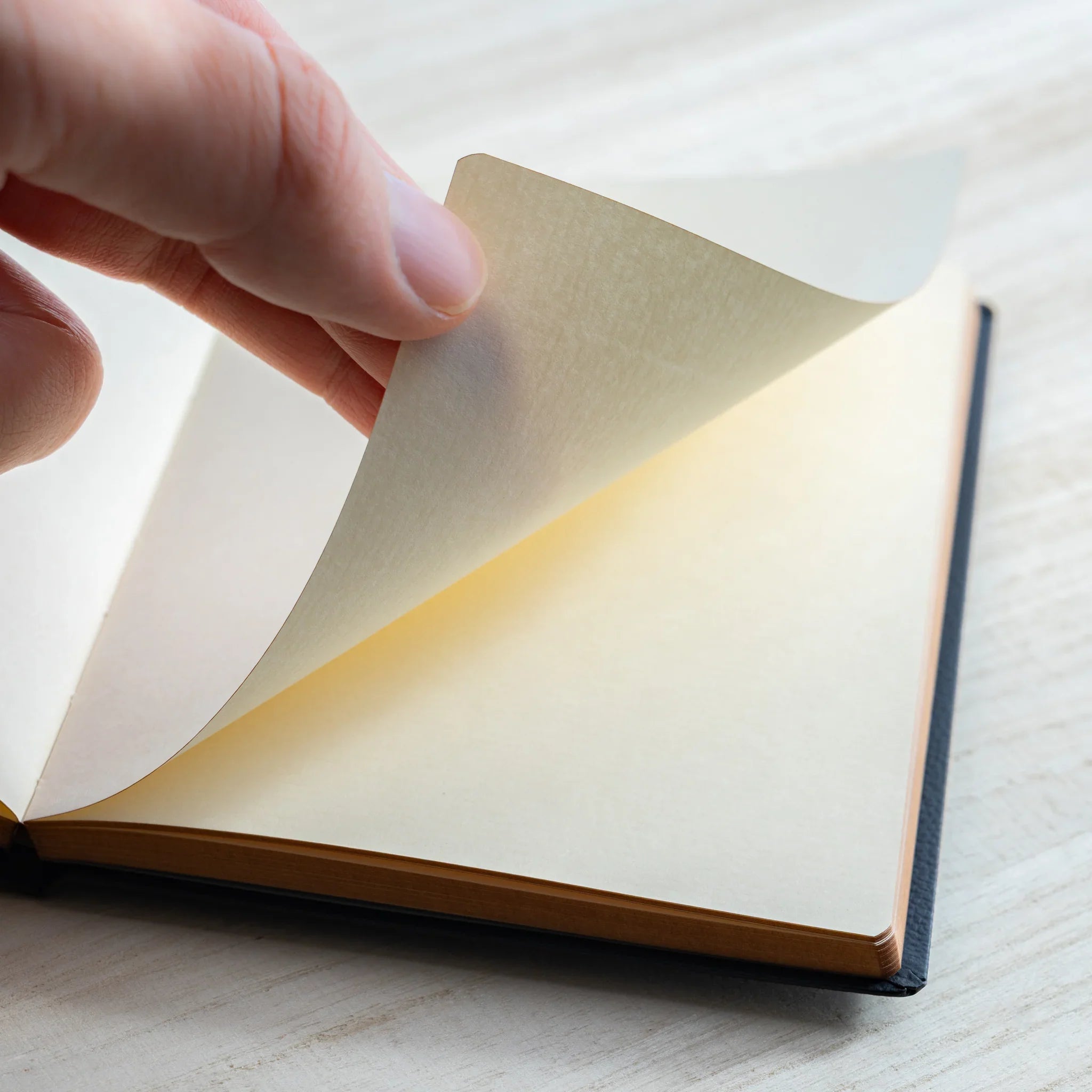 Life Noble A6 planning notebook featuring interior pages, closed front cover highlighting binding quality