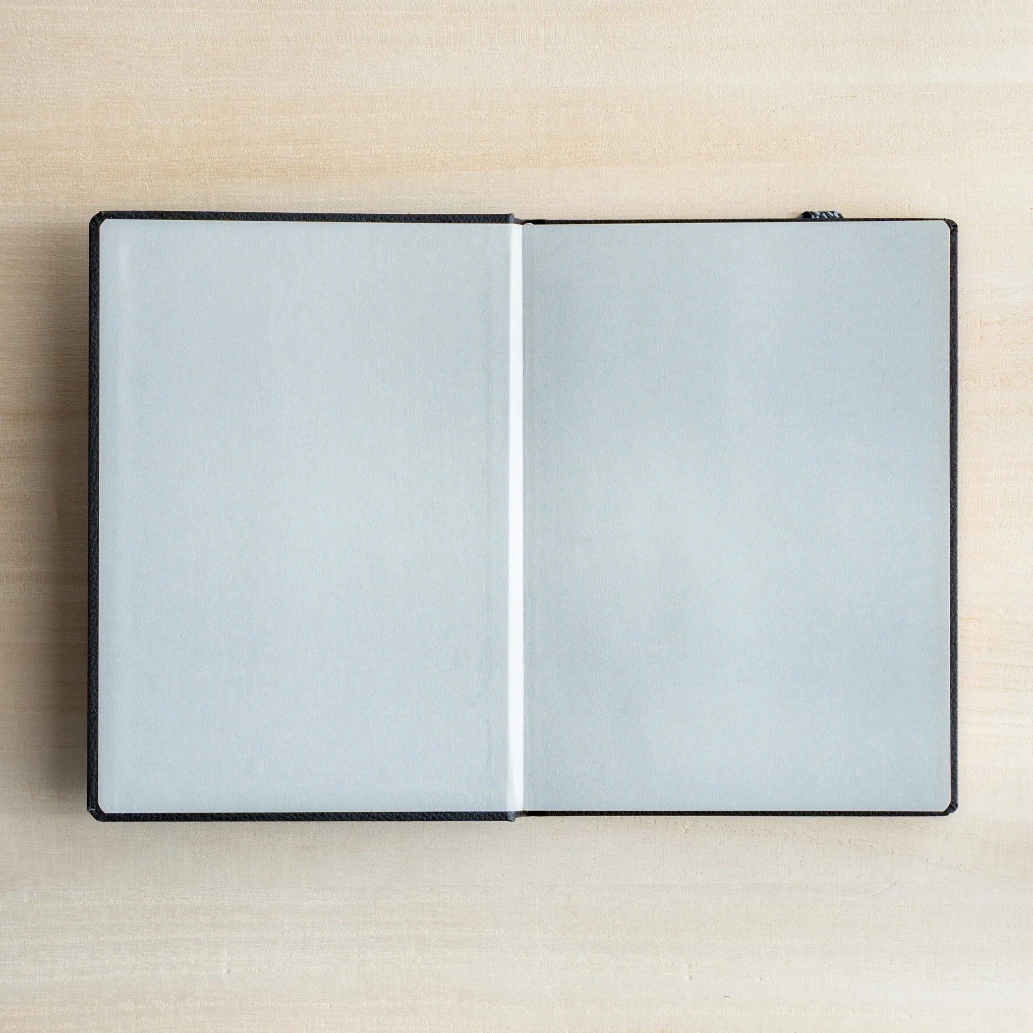 Life Noble A6 planning notebook, open view showing interior pages with binding quality