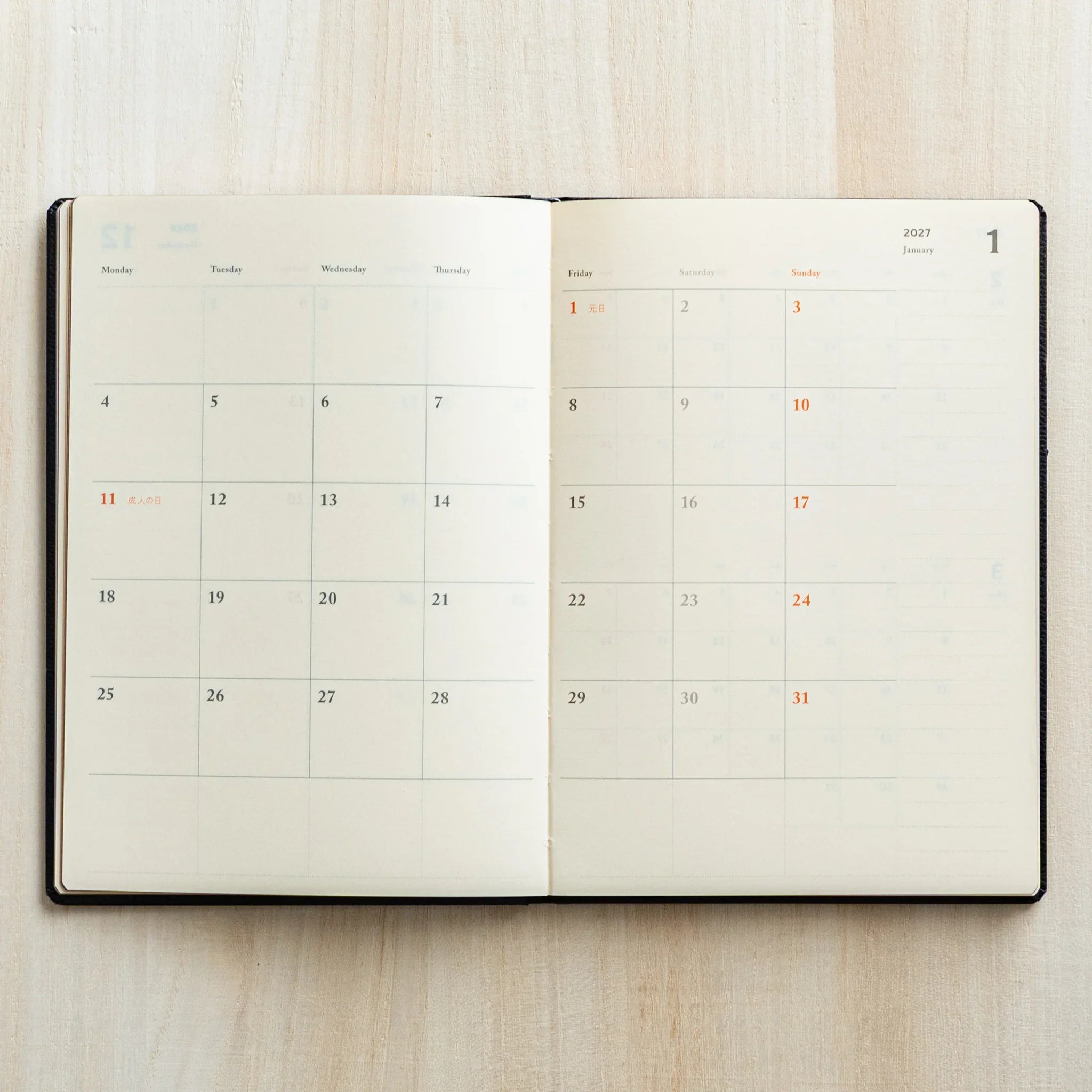 Monthly calendar page for January 2027 in the LIFE Noble Planner 2026 Japanese Planner with a sticker marking one date.