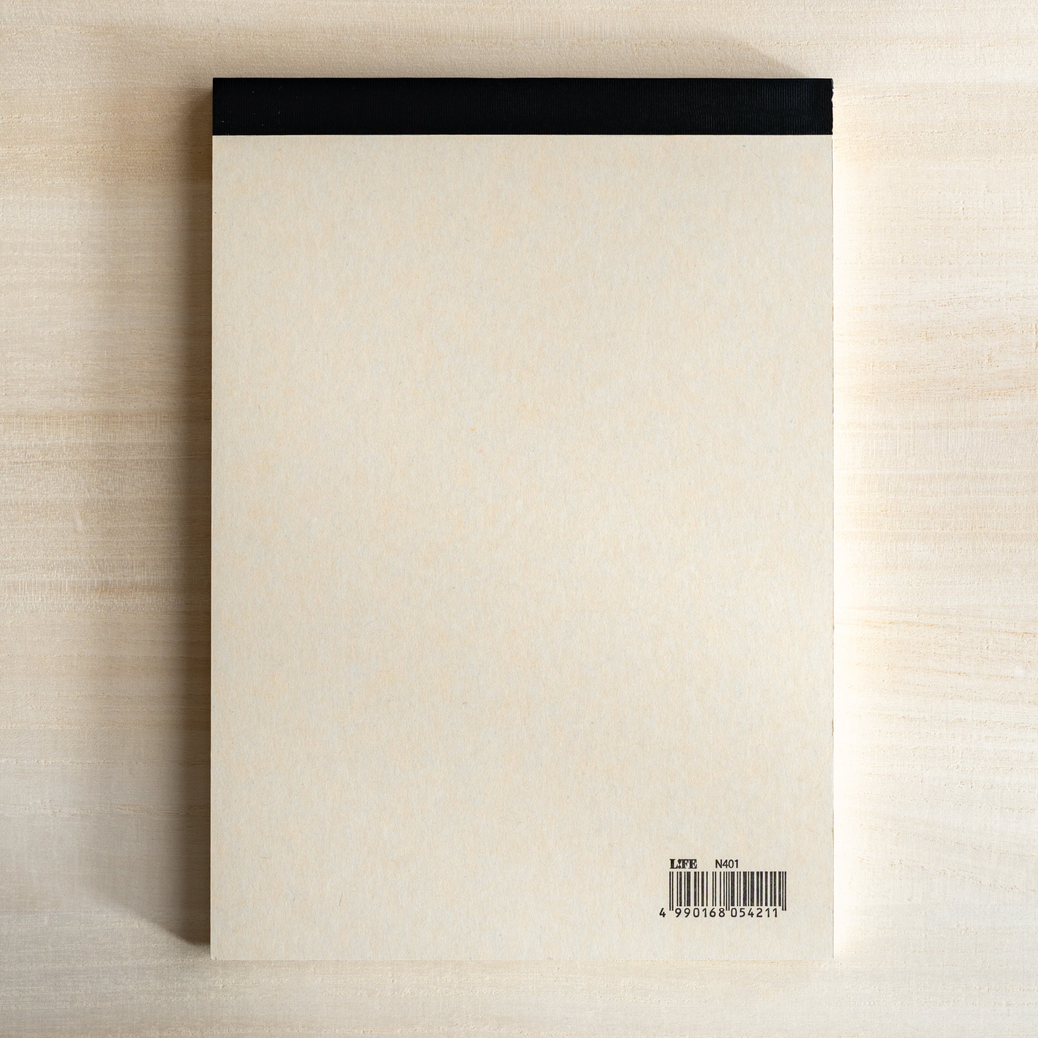 Life Noble writing pad back view with cream paper and top binding, minimalist Japanese stationery pad with barcode detail