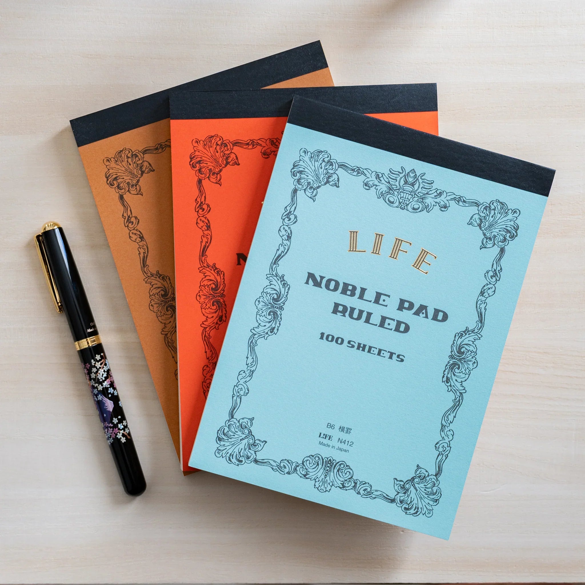 Life Noble B6 writing pad, angled view showing decorative cover design and color options