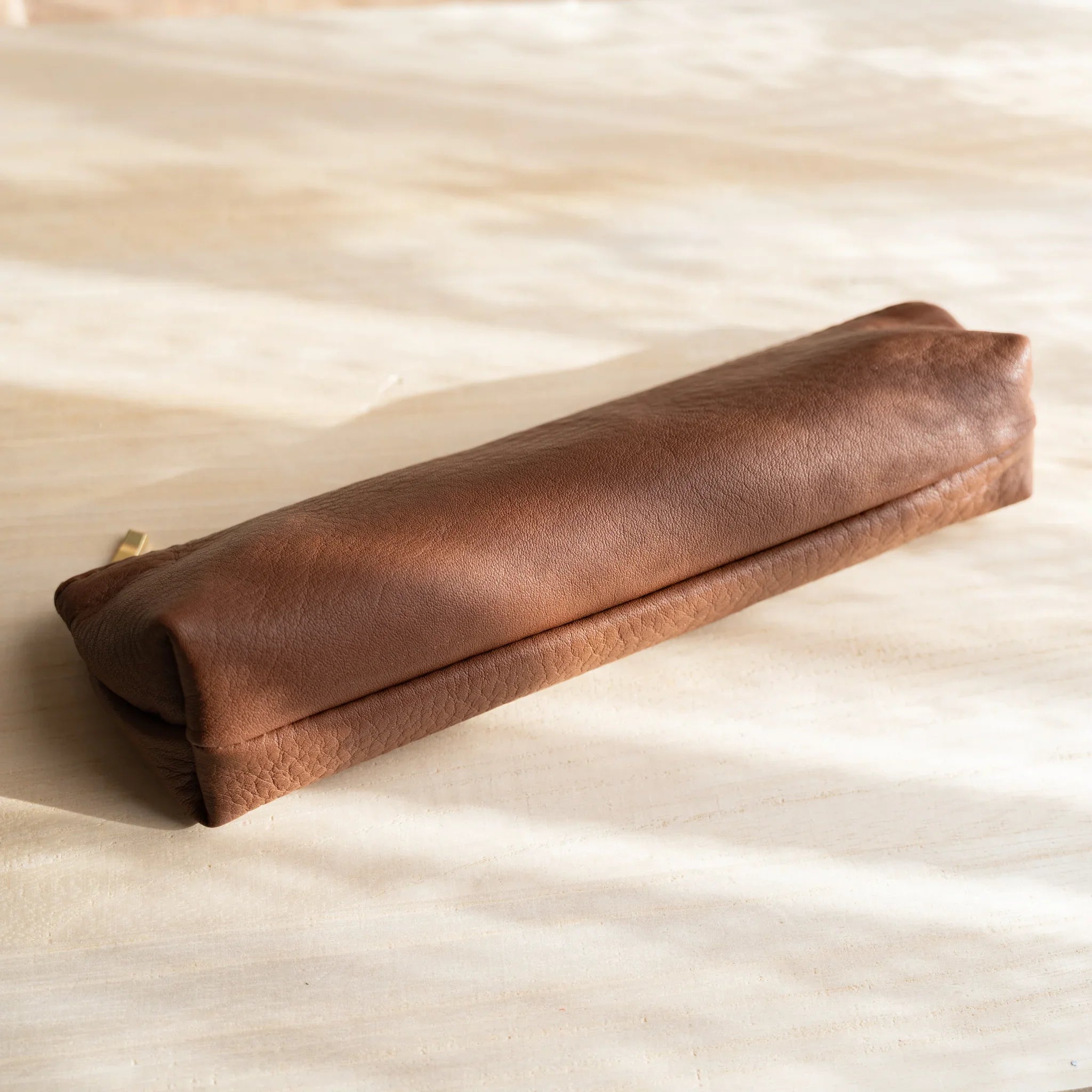 Leather case detail showing steerhide material characteristics and features and features and features