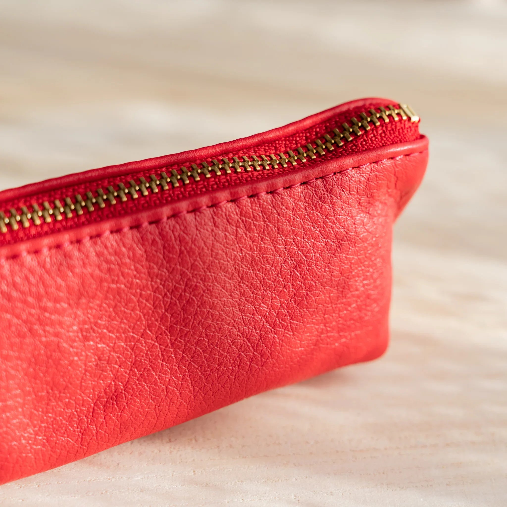 Top view of red case showing opening and closure design and features and features and features and features