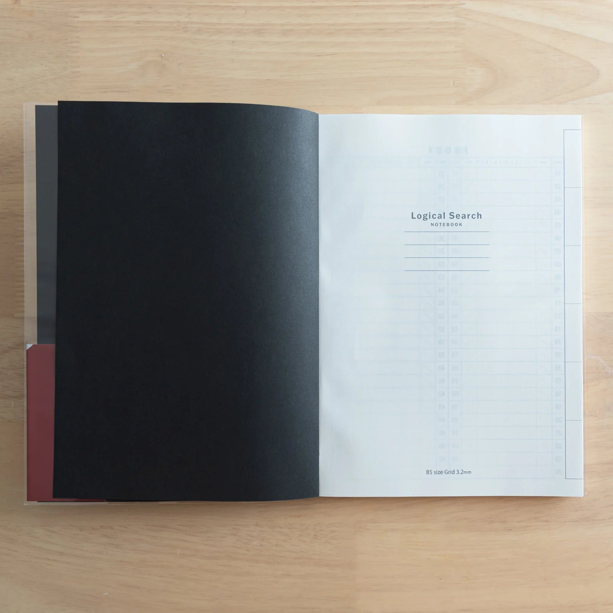 Logical Search Notebook open to first interior page showing Japanese introduction and title information