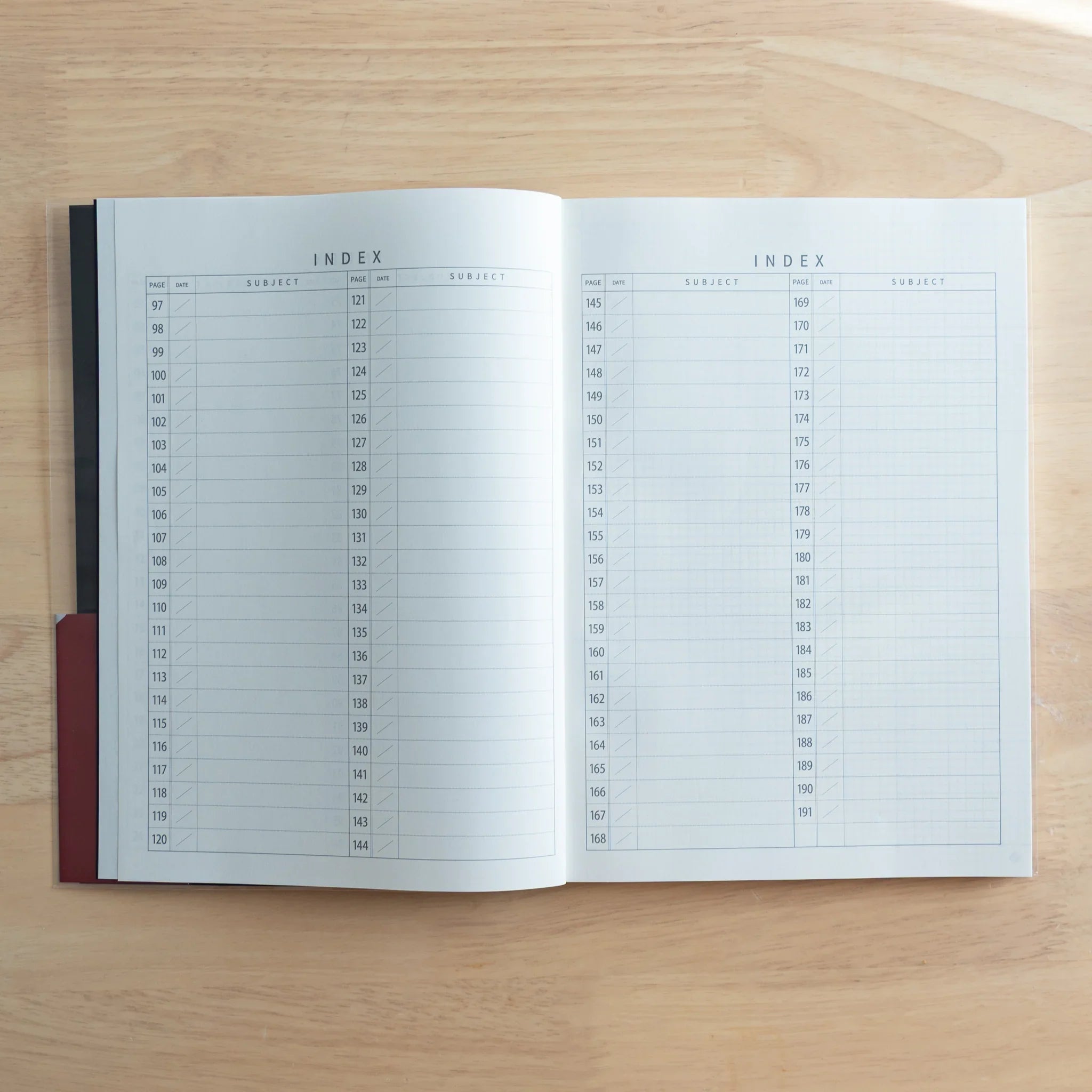 Logical Search Notebook flat lay on wooden surface showing complete front cover design and typography