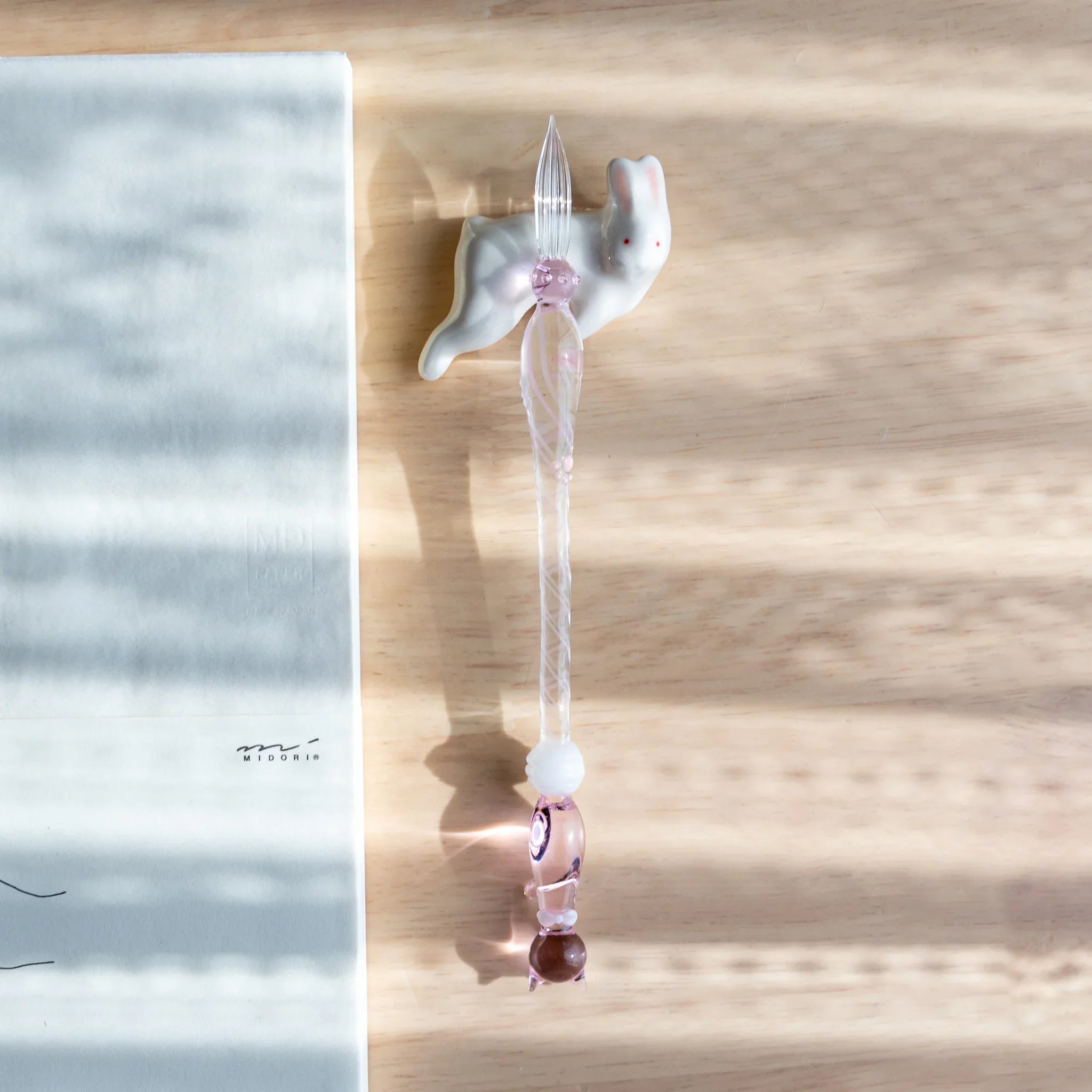 Rabbit ceramic pen rest gray handcrafted Japanese with lying down position and gentle animal shape form close shot