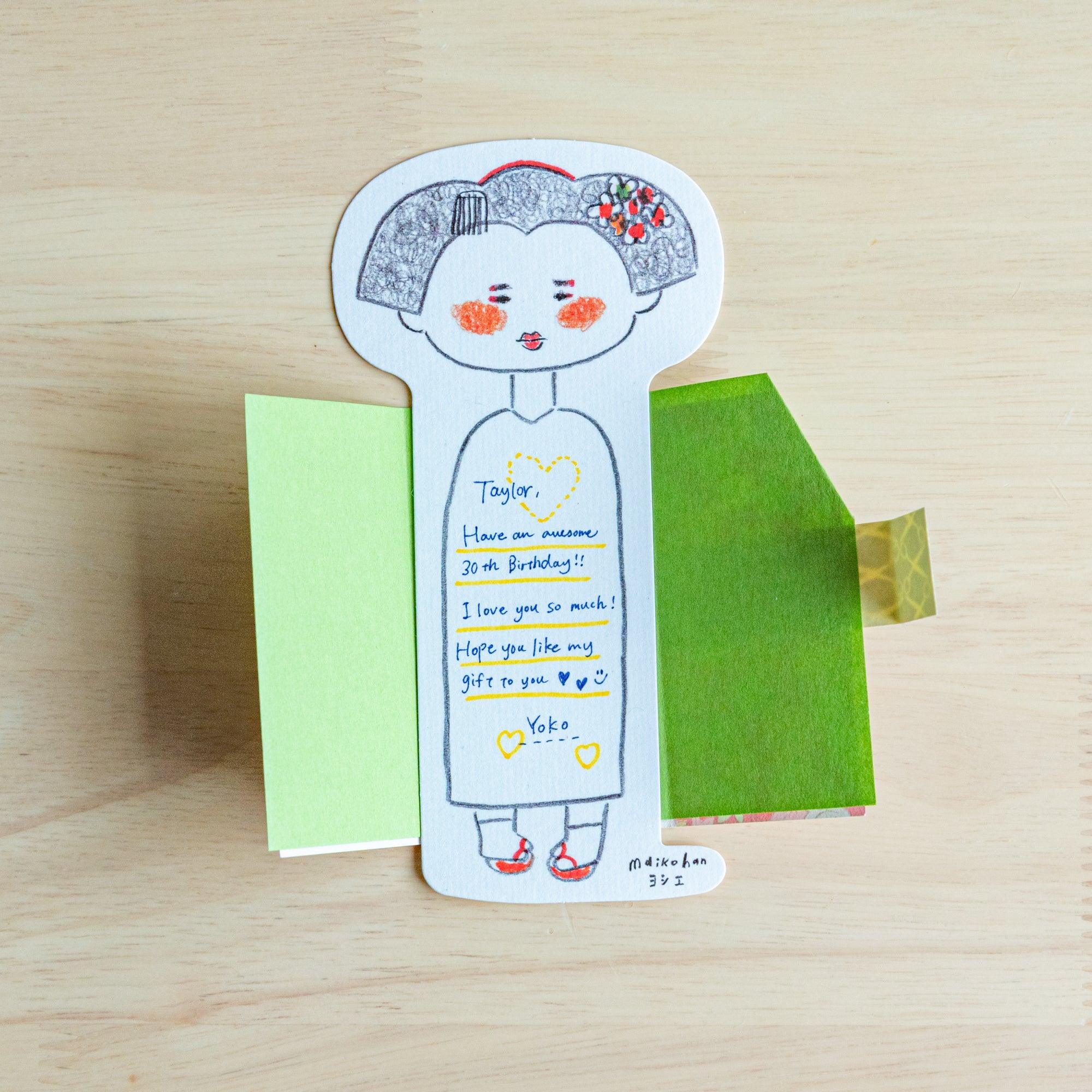 Maiko-shaped message cards adorned with vibrant Yuzen washi patterns, each featuring unique kimono designs inspired by Japanese traditions.