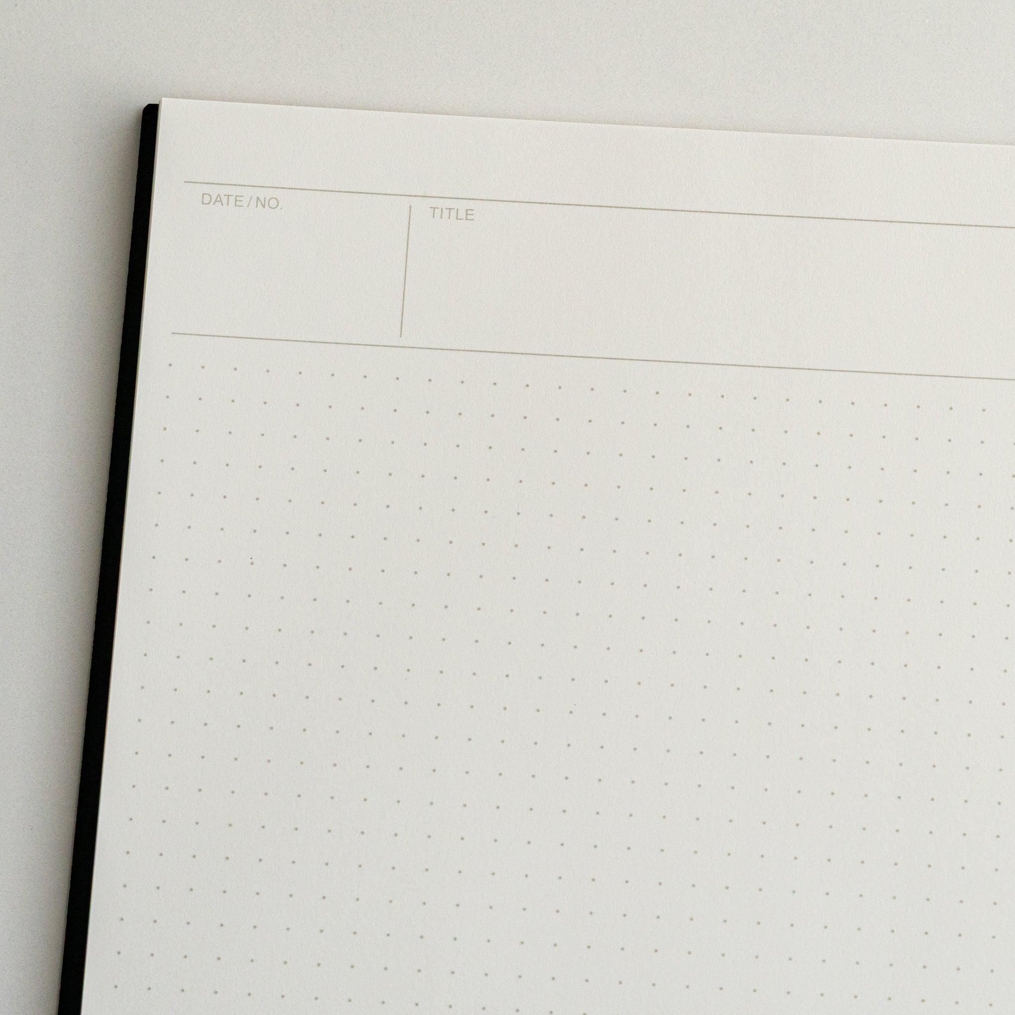 Maruman Mnemosyne notebook, close-up of cover and dot grid, Japanese Mnemosyne A5 5mm dot grid pad with smooth paper for