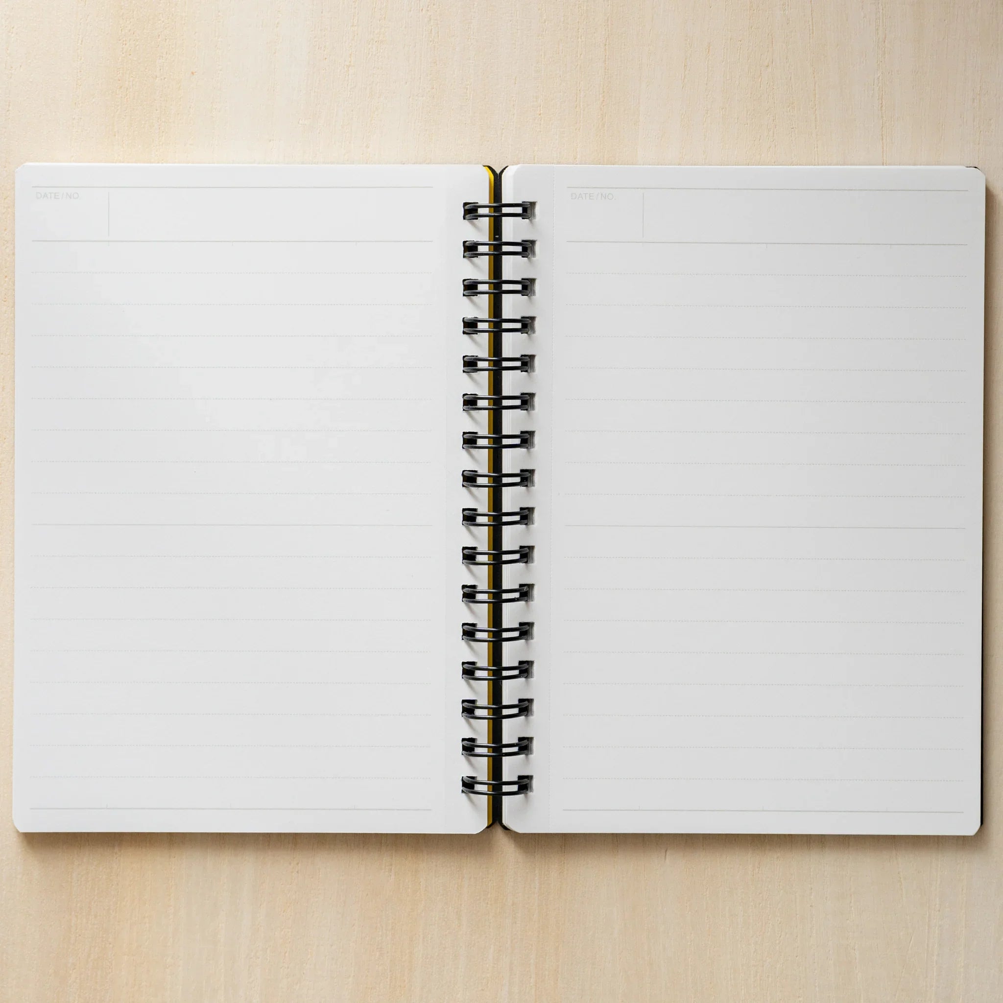 Maruman Mnemosyne notebook, side profile showing notebook binding, Mnemosyne Japanese notepad with detachable sheets and