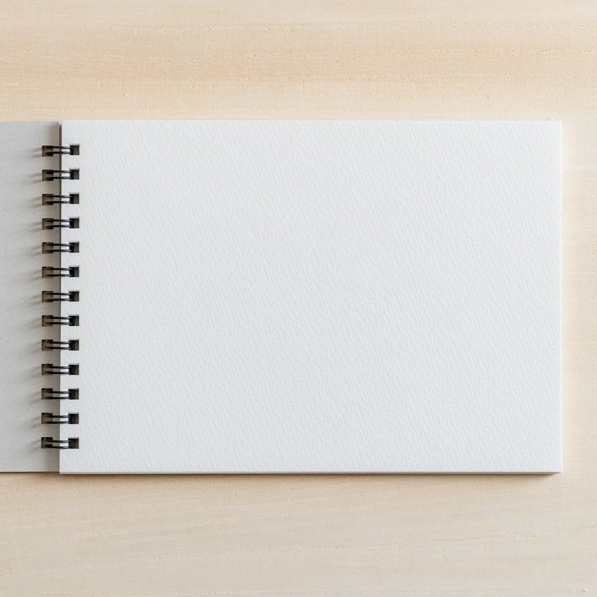 Maruman Zuan sketchbook, binding detail showing ring mechanism, Japanese stationery item with quality construction and