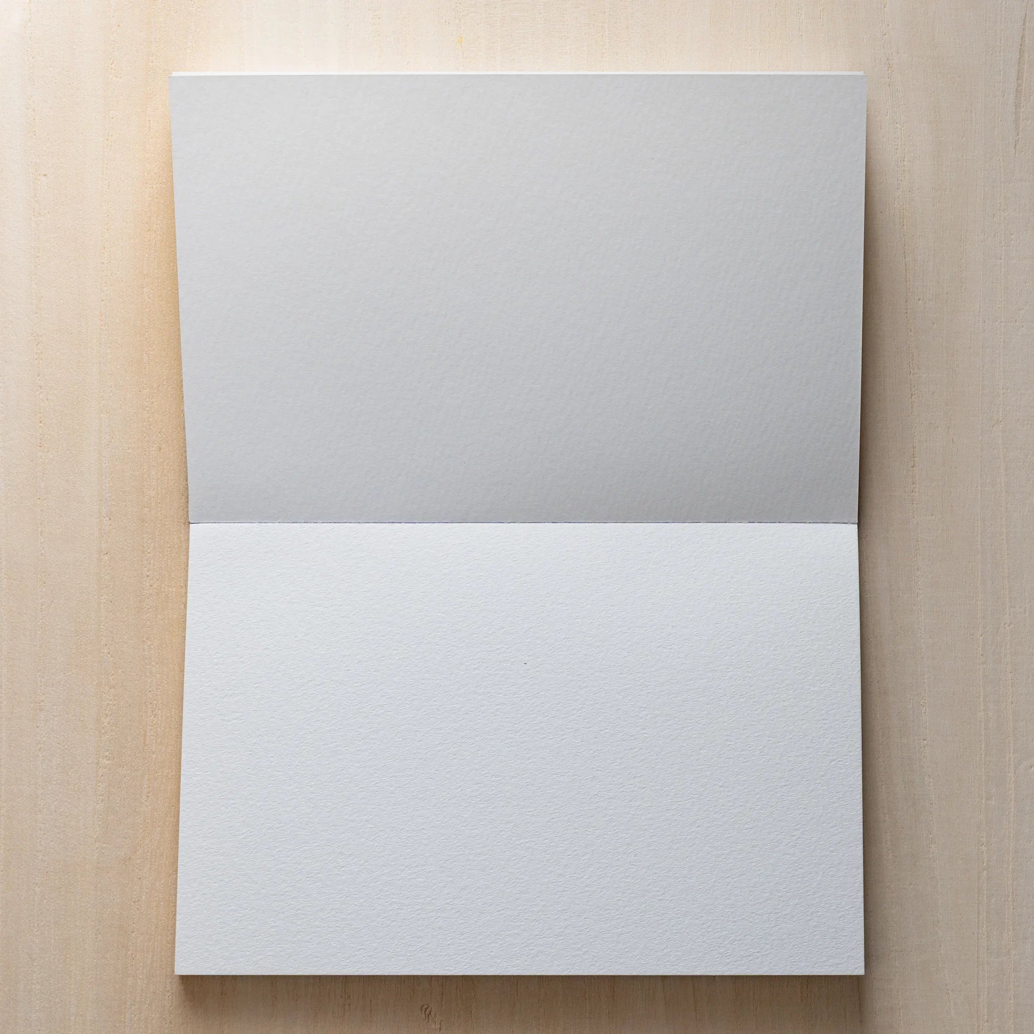 Maruman Zuan sketch pad, edge view showing pad thickness and binding, Japanese stationery product with quality design and