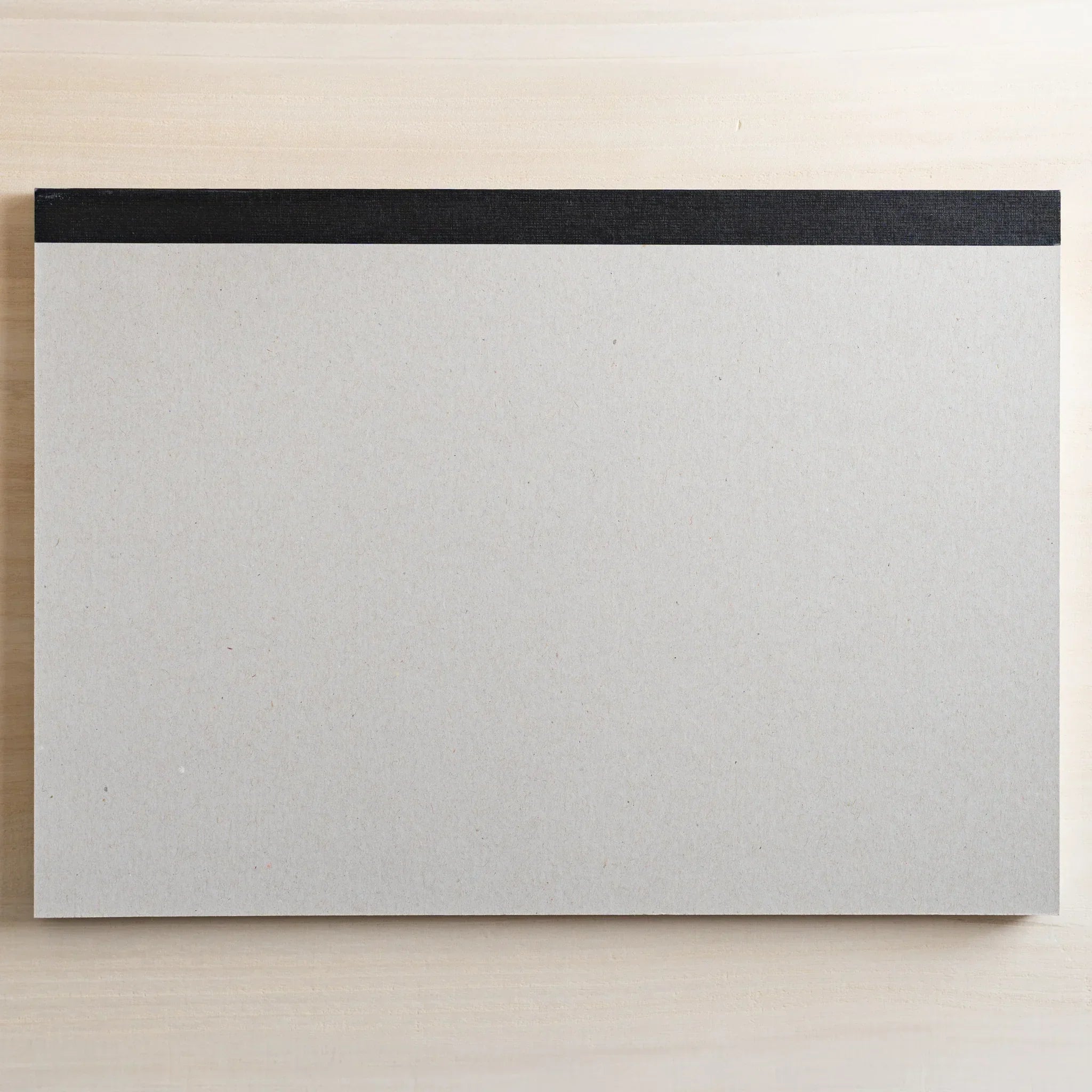 Maruman Japanese sketchbook drawing pad with grey cardboard back cover and black top binding tape for arts and crafts.