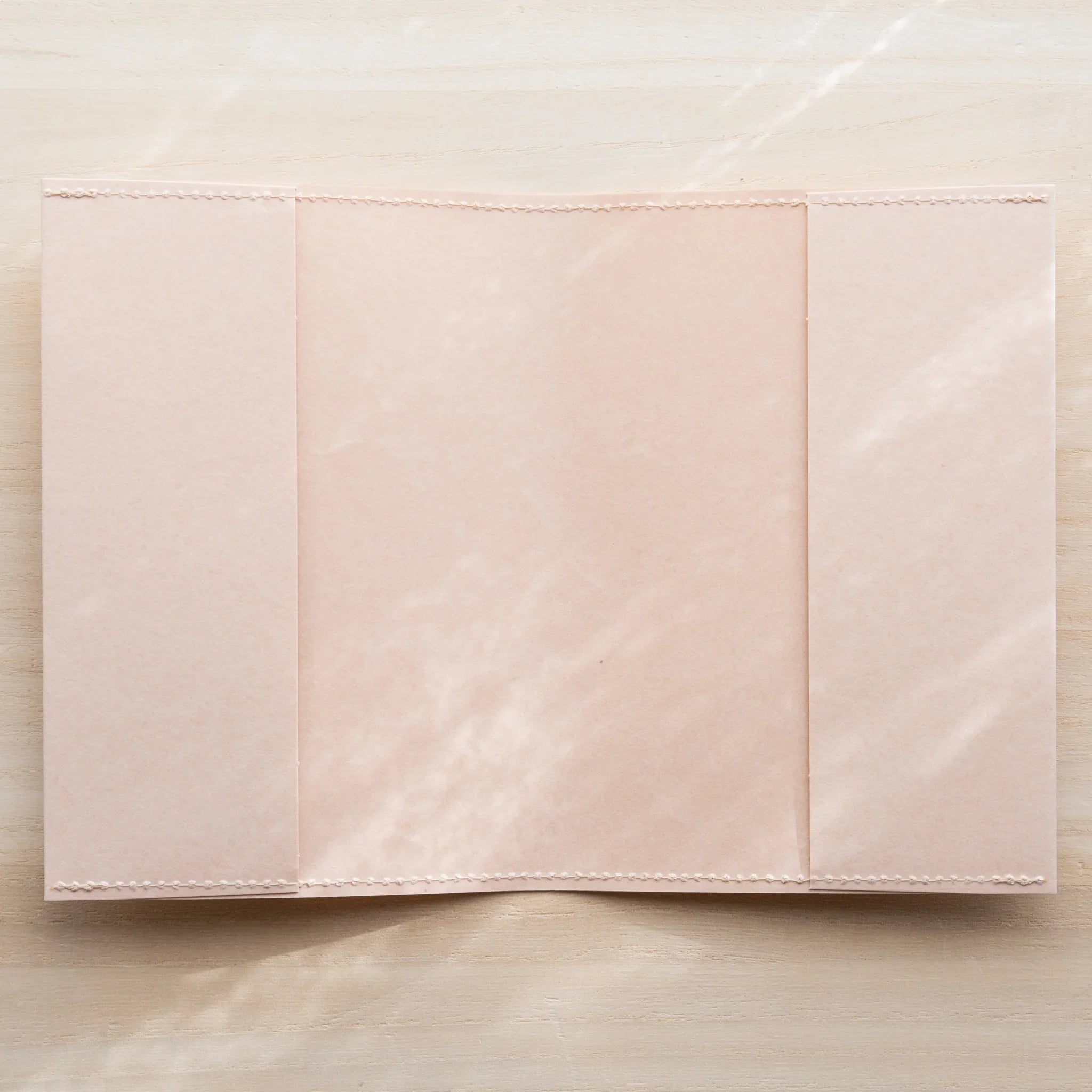 Pale pink MD Notebook Paper Cover opened to show the inside flap