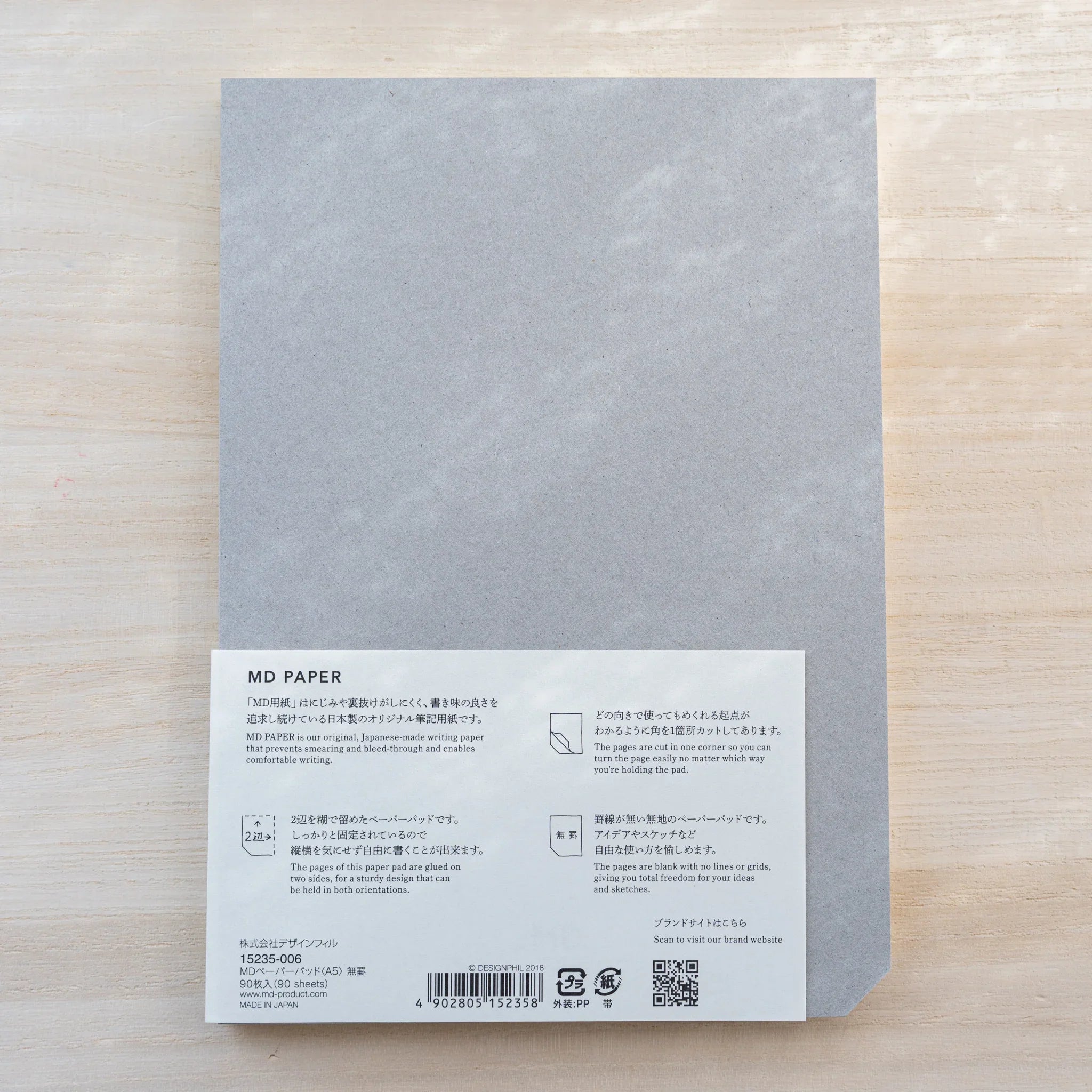 Midori MD Paper Pad A5 back with gray board and belly band detailing 90 sheets, glued two sides, and Made in Japan