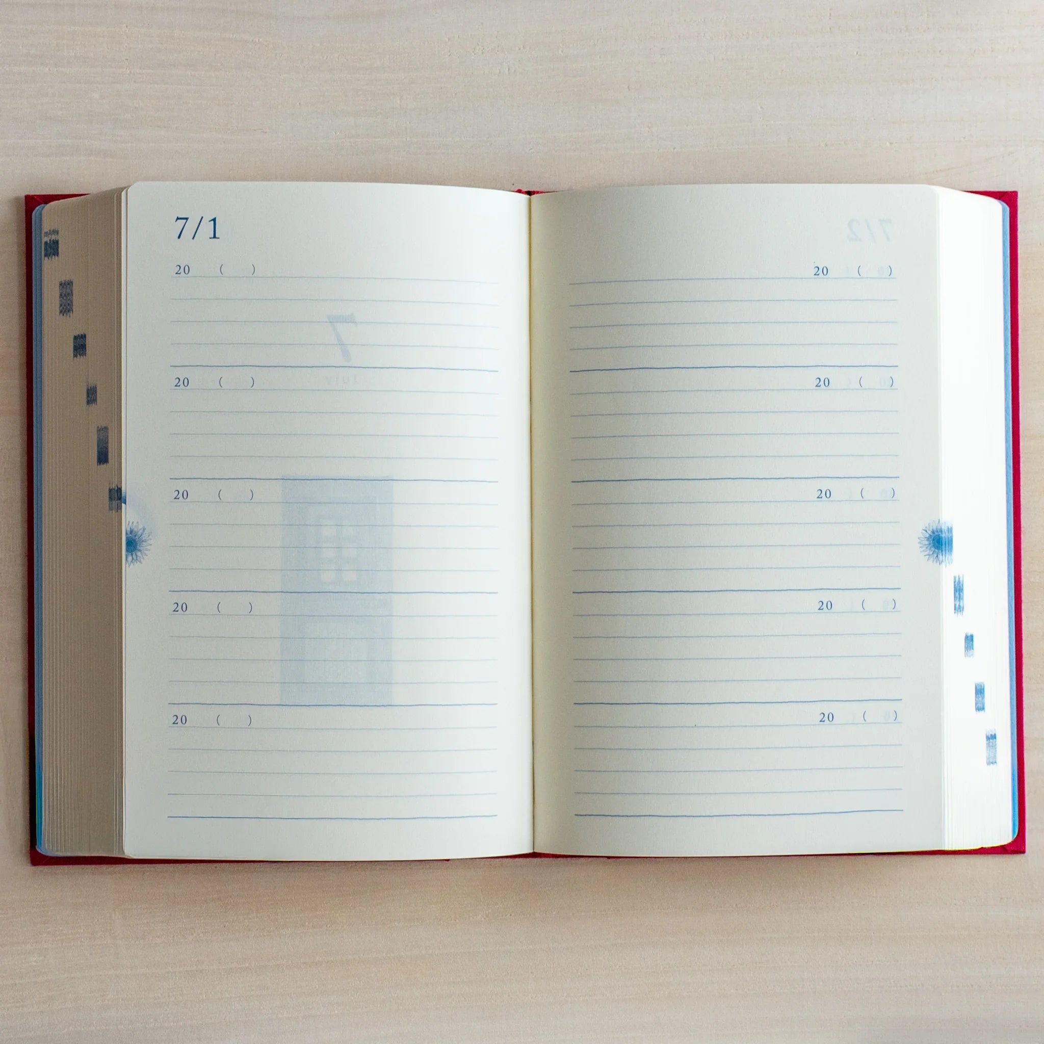 Midori 10-year journal, page spread showing date sections and margin area, Japanese stationery product with quality materials