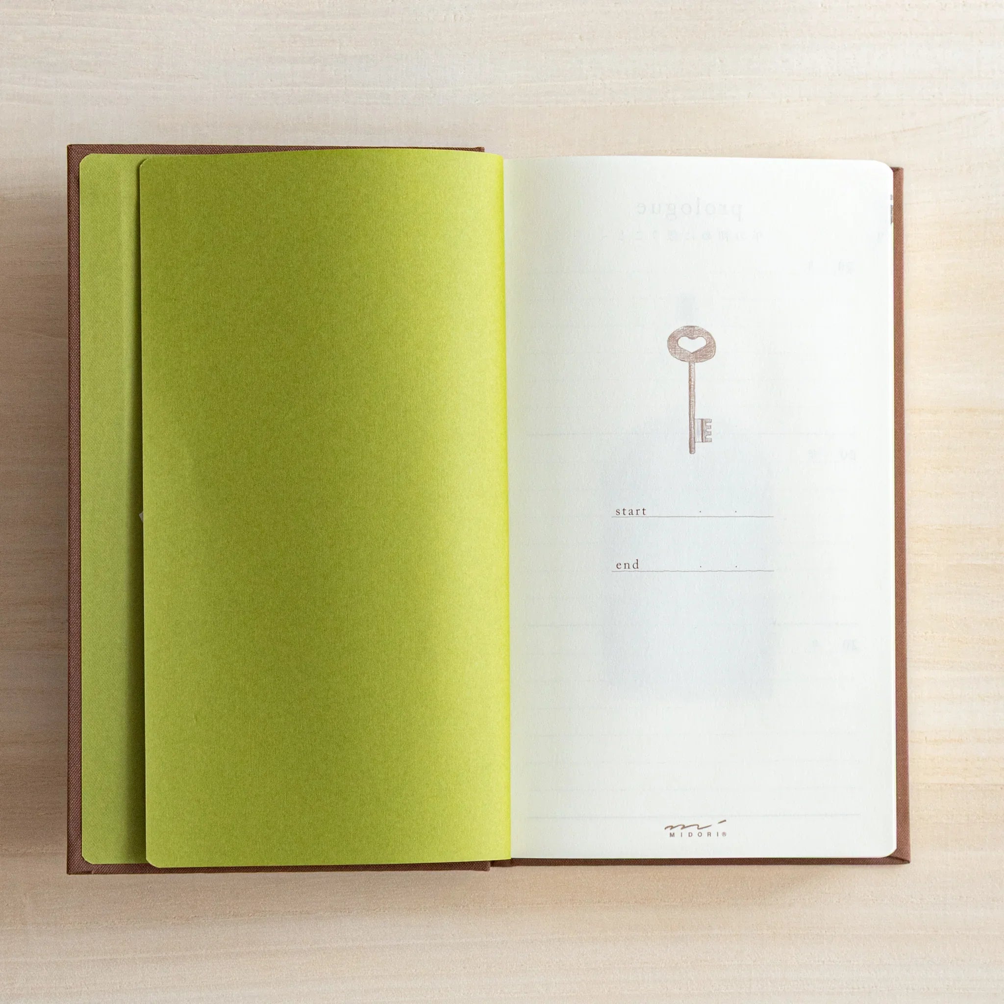 Midori 3-year journal, angled view of closed journal with gate embossing, Japanese hardcover 3-year dated diary from Midori