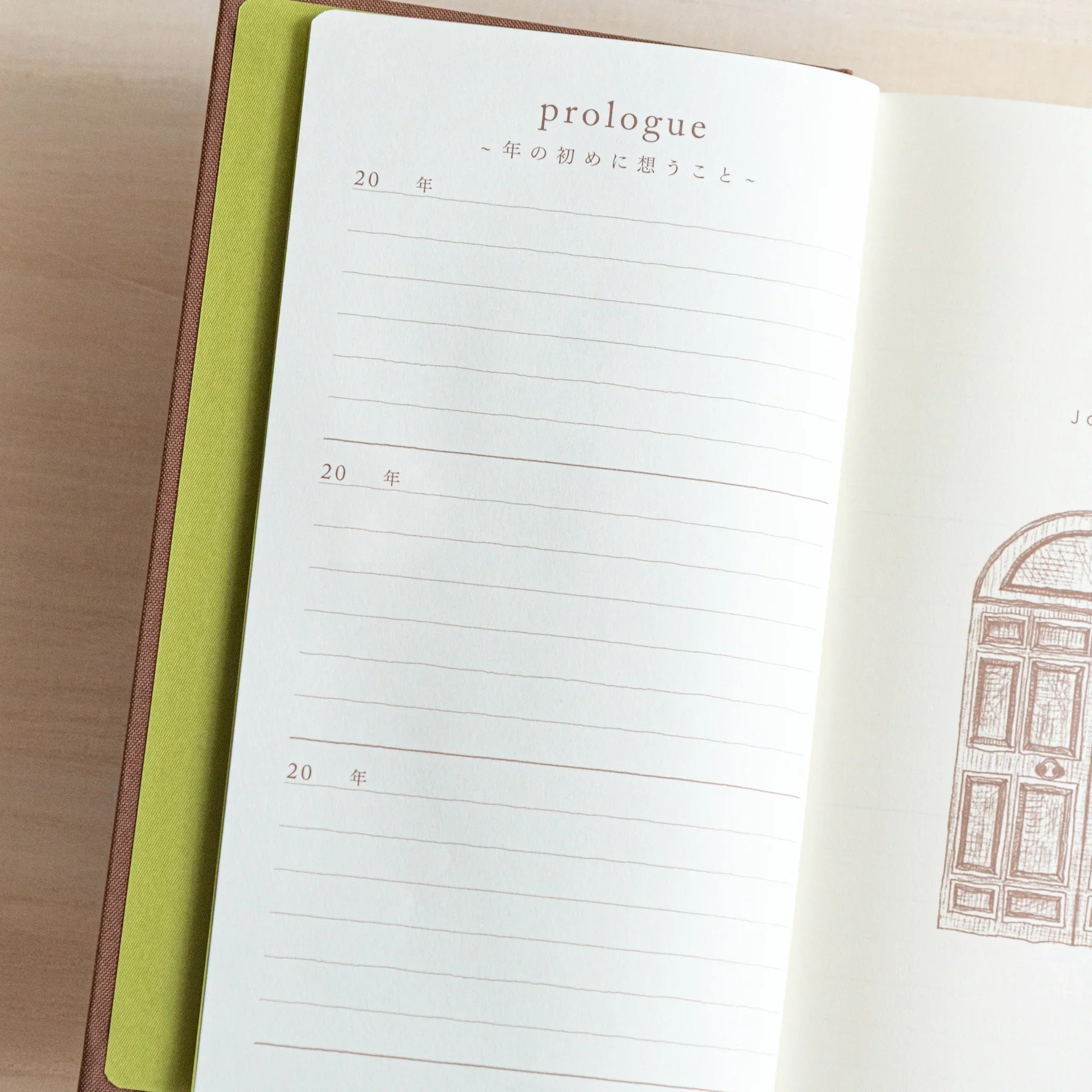 Midori 3-year journal, detail shot of embossed gate on cover, compact Midori 3-year dated hardcover notebook made in Japan