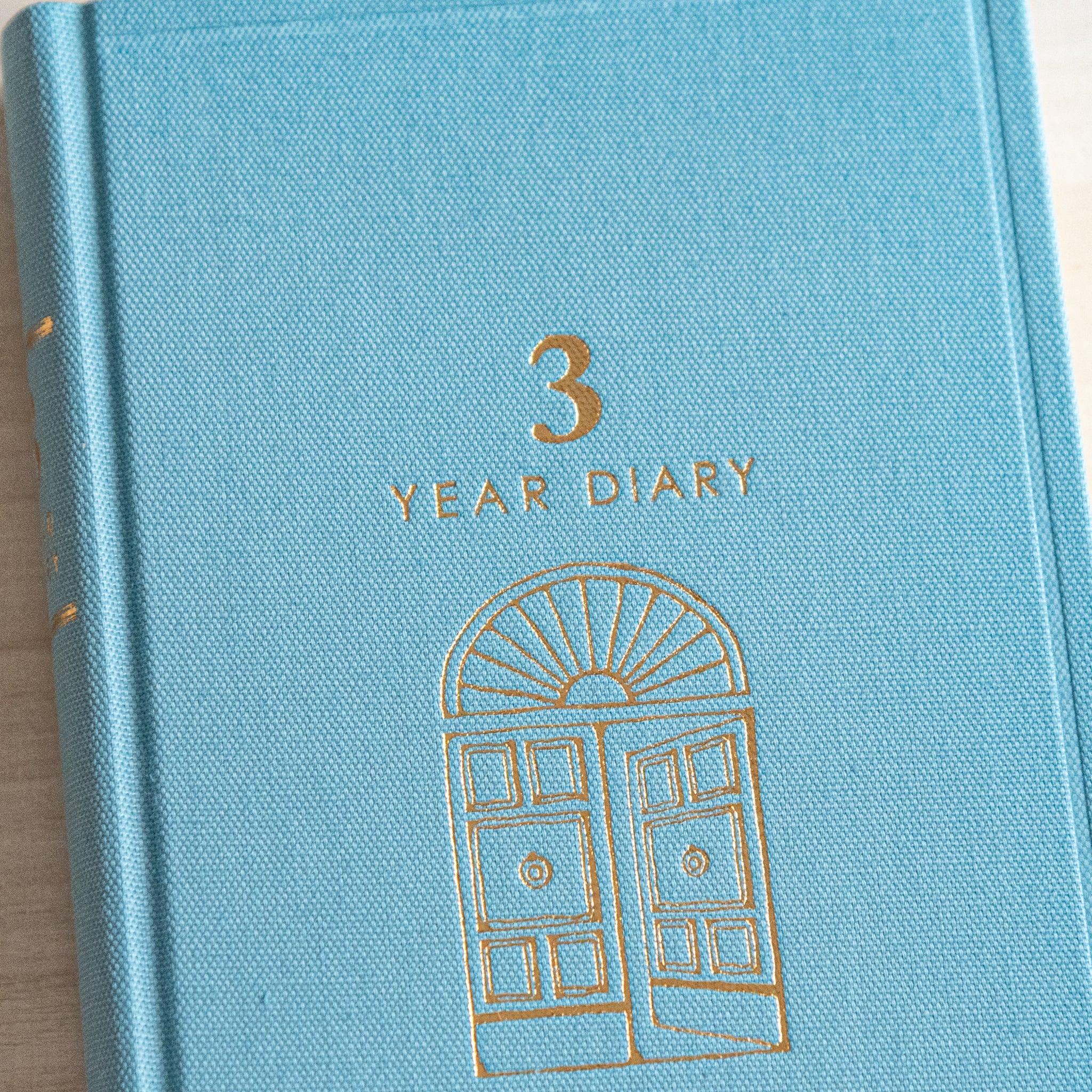 Midori 3-year journal, side view showing gate pattern on spine with binding detail, Japanese Midori diary for multi-year