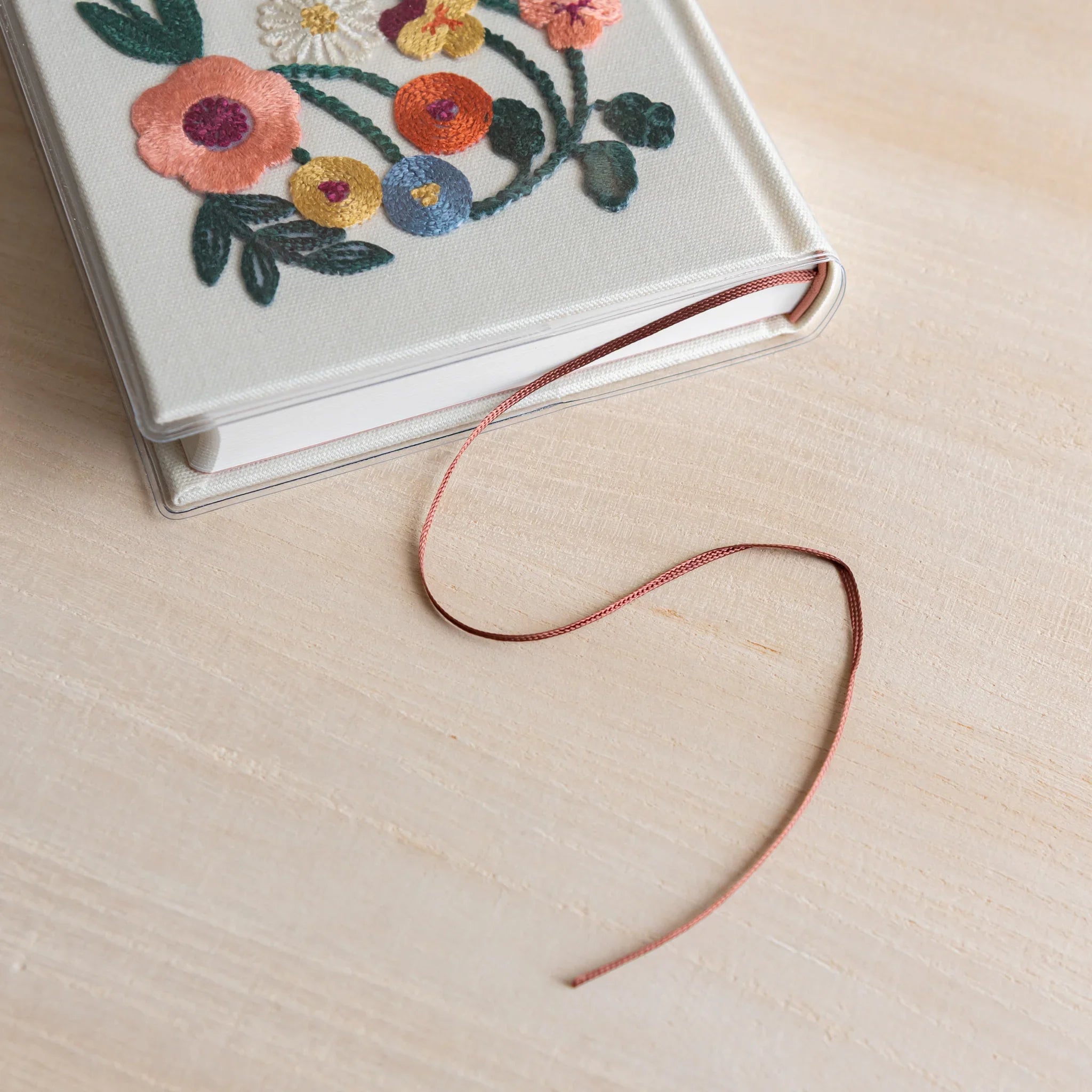 Midori 5-year journal, binding detail showing case and embroidery quality, Japanese stationery product with quality materials