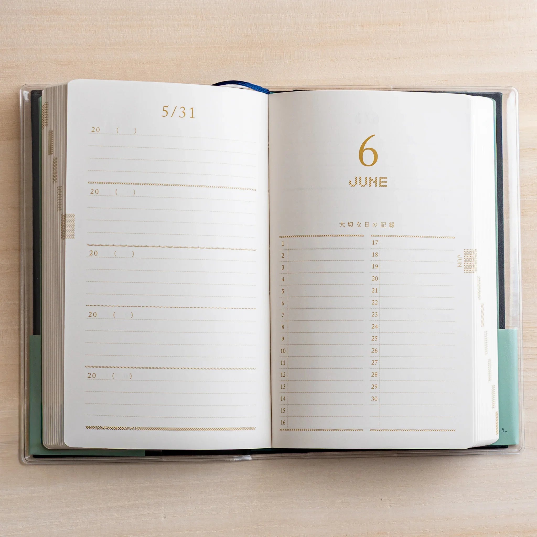 Midori 5-year journal, opened to showing five-year overview page, Japanese stationery product with quality design and