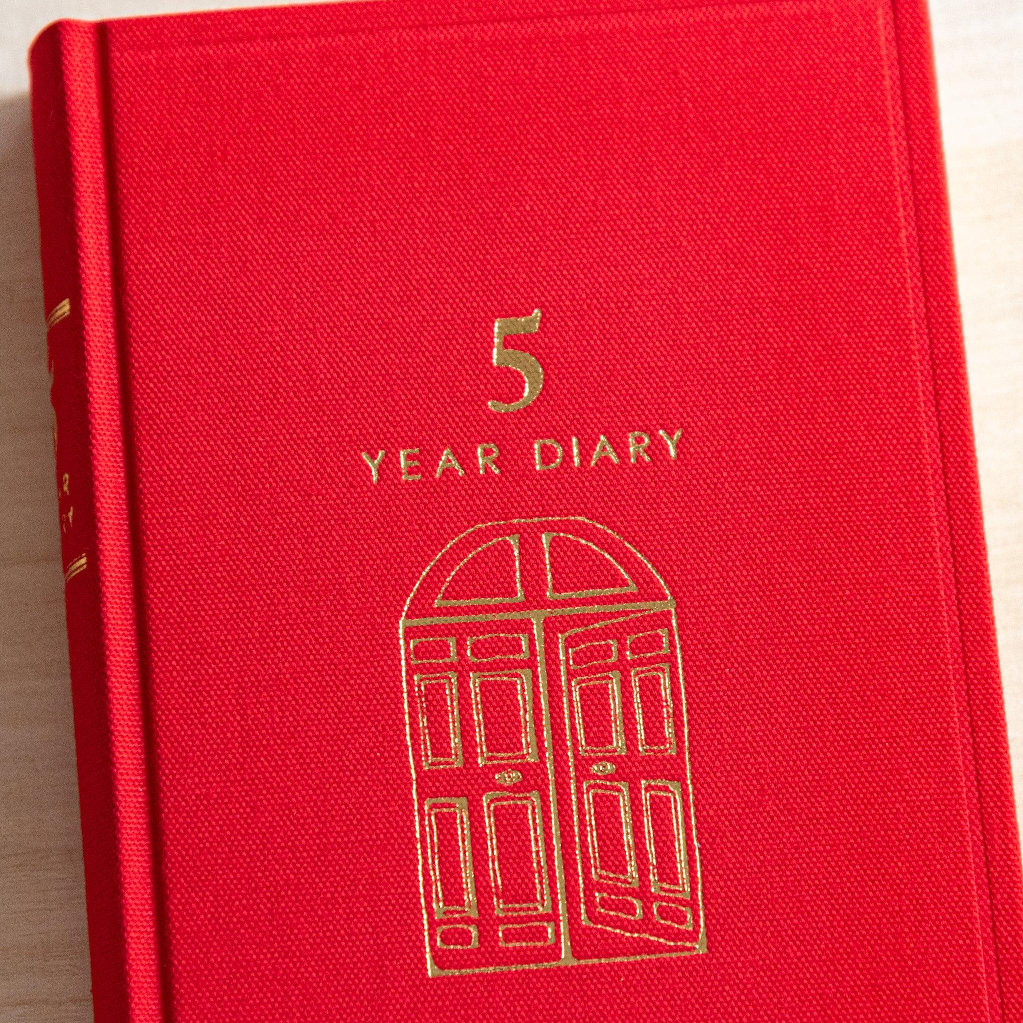 Midori 5-year journal, side profile showing gate pattern on binding and spine, stationery item from Japan with quality