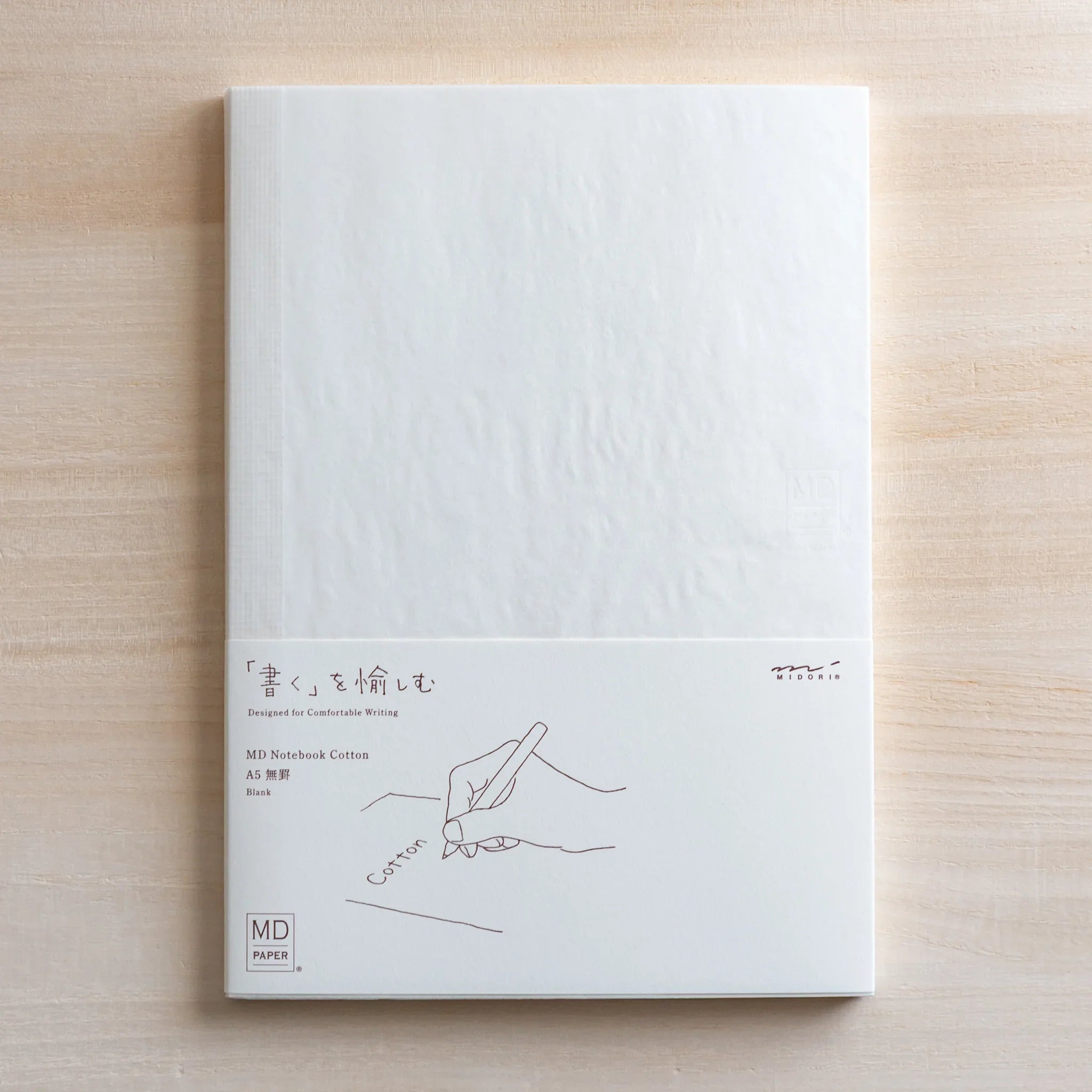 Midori MD Cotton notebook in A5 size with blank pages and cloth cover and features and features and features