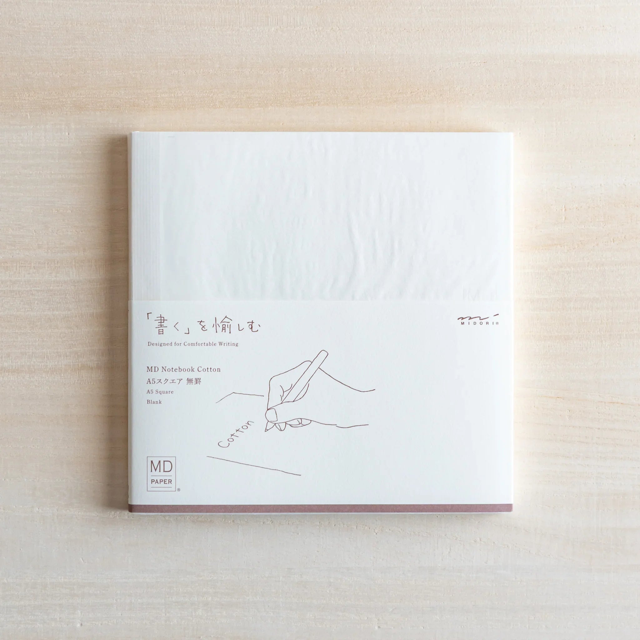 Midori MD Cotton notebook in A5 size with square grid paper and cloth cover and features and features