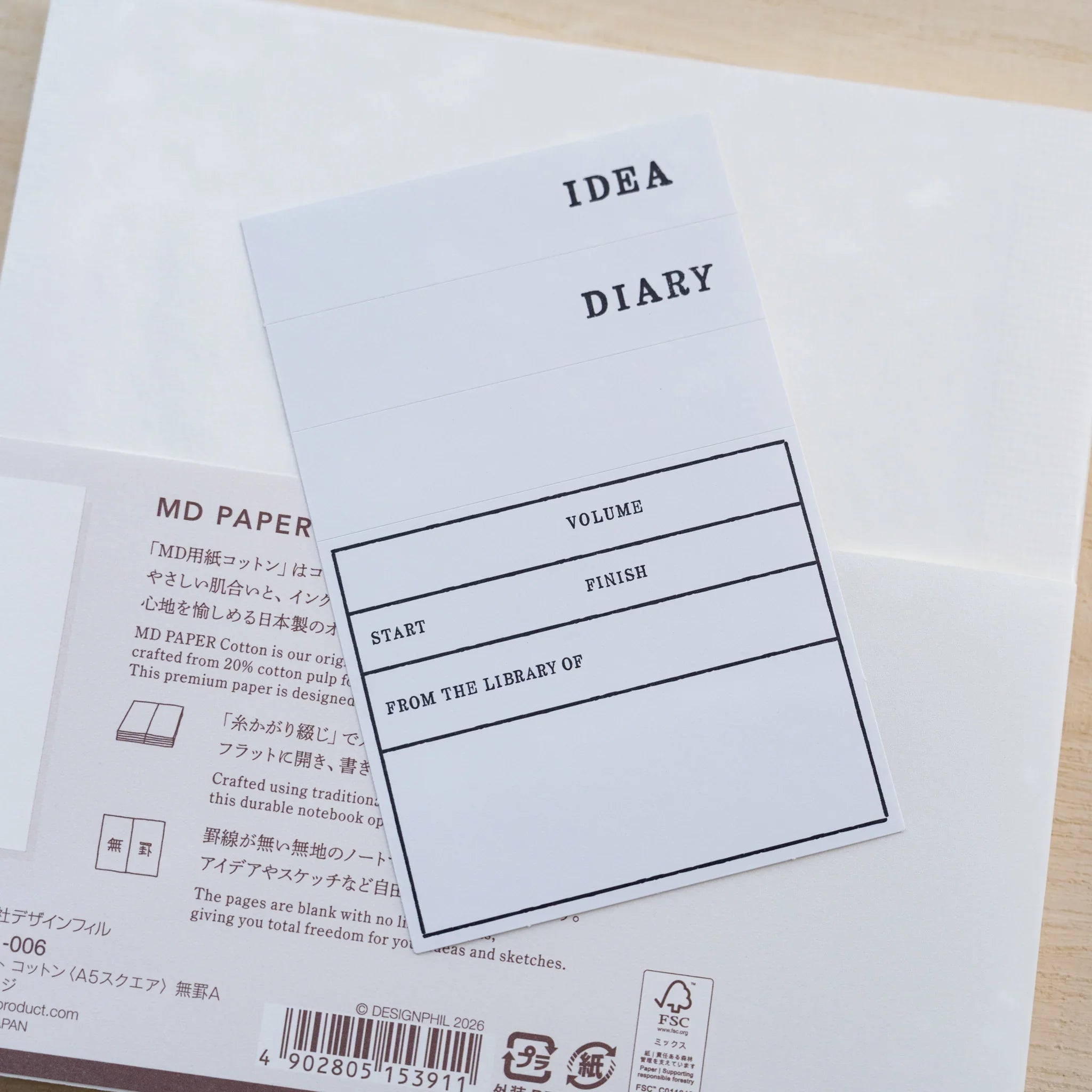 Back of MD Cotton Notebook A5 Square with MD PAPER belly band and IDEA DIARY insert card with barcode