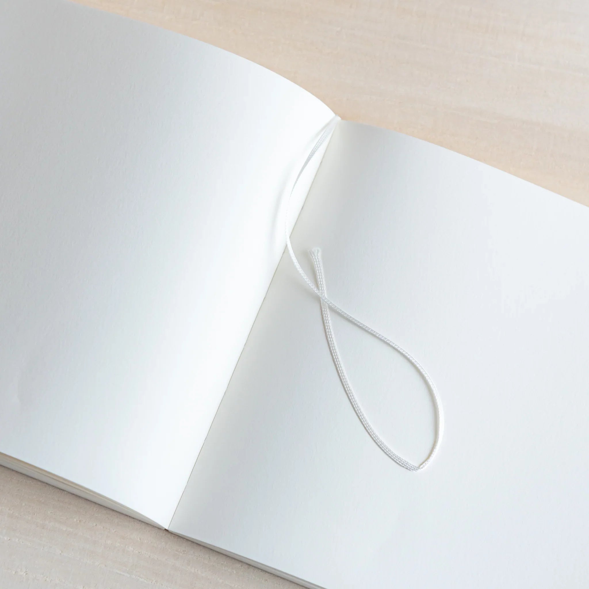 Inside pages showing square grid pattern and features and features and features and features and features