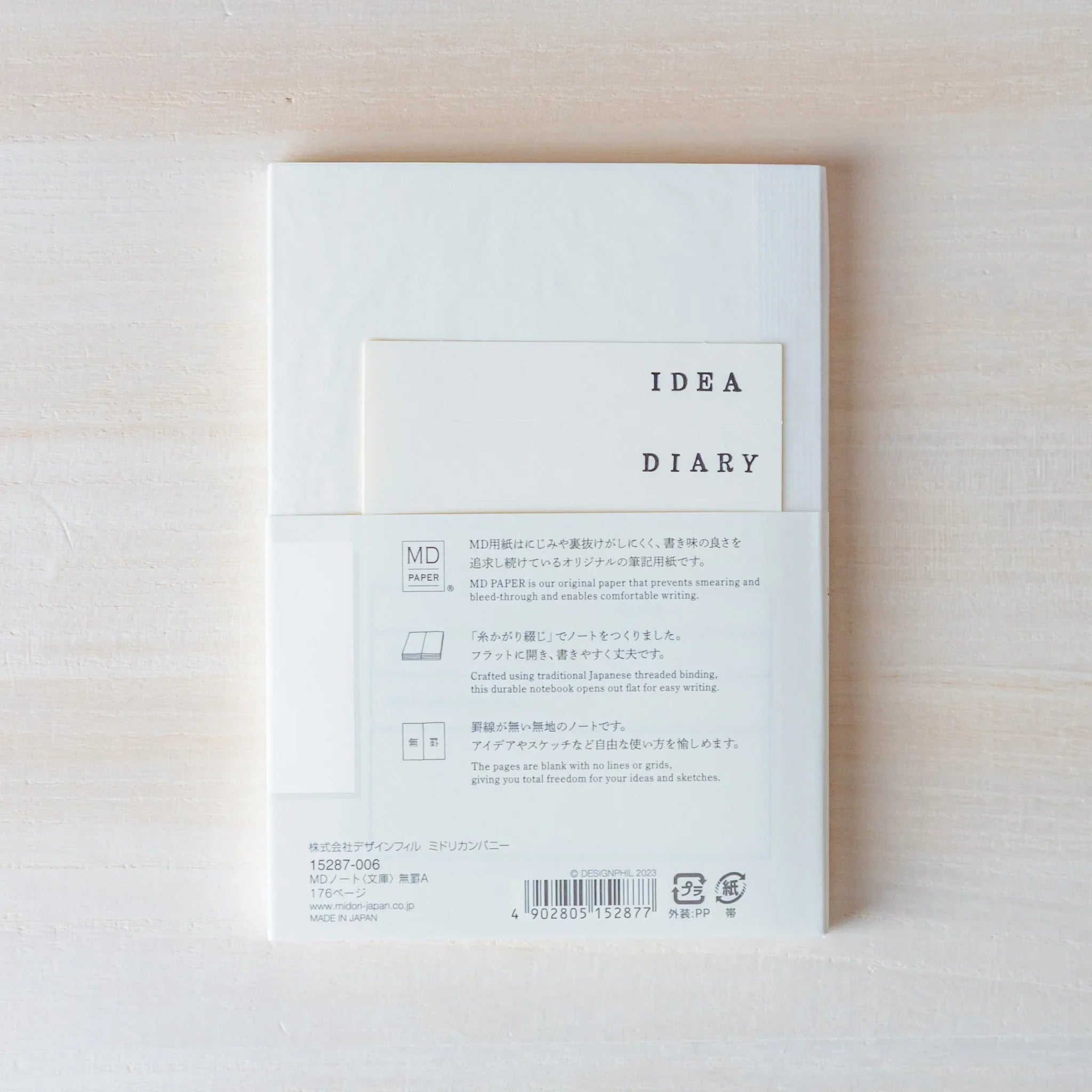 Japanese Notebook Midori MD A6 back view, showing IDEA DIARY text and the MD Paper information band.