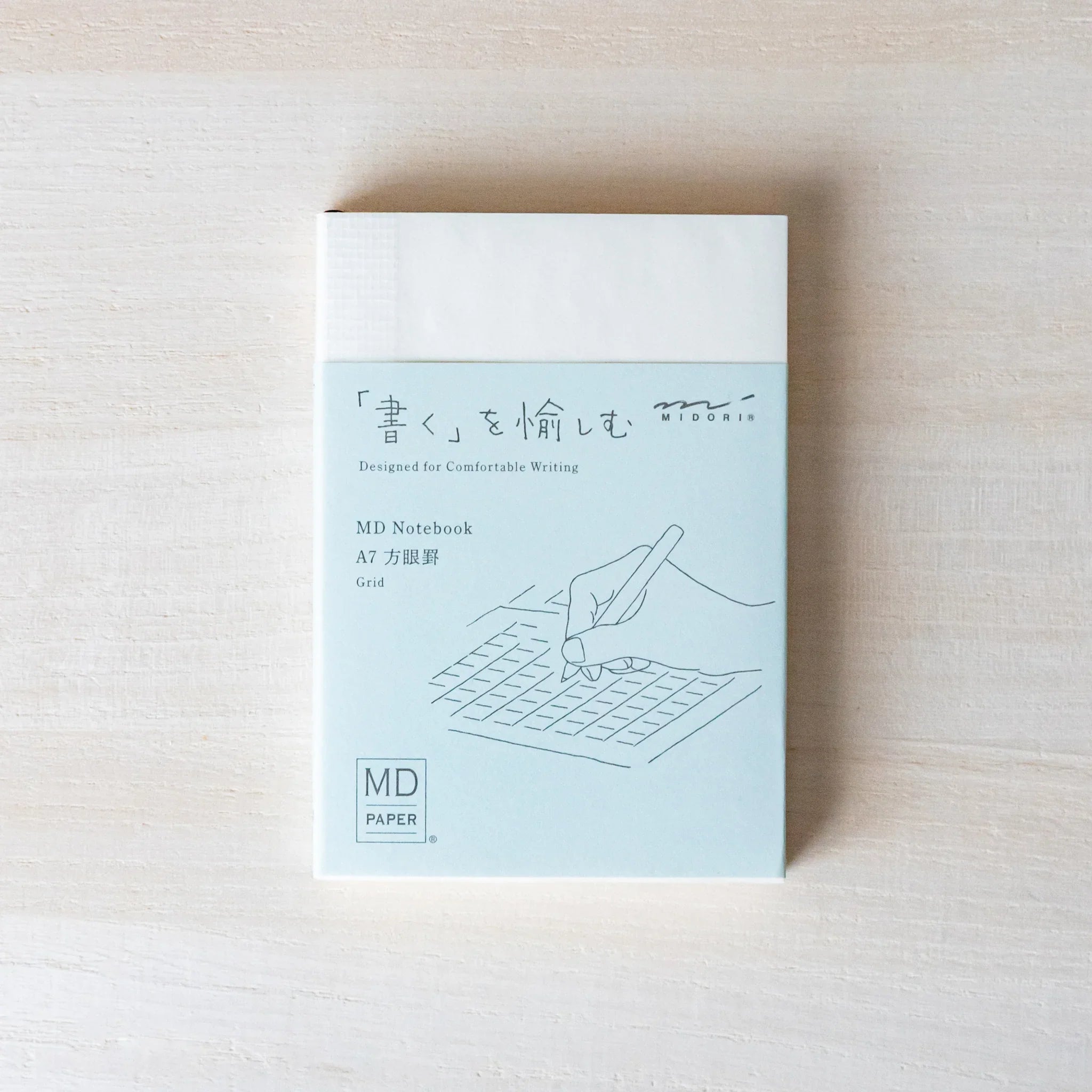 Midori MD A7 notebook, detail shot of small binding and page edges, MD Notebook from Midori with thick cream paper and plain,