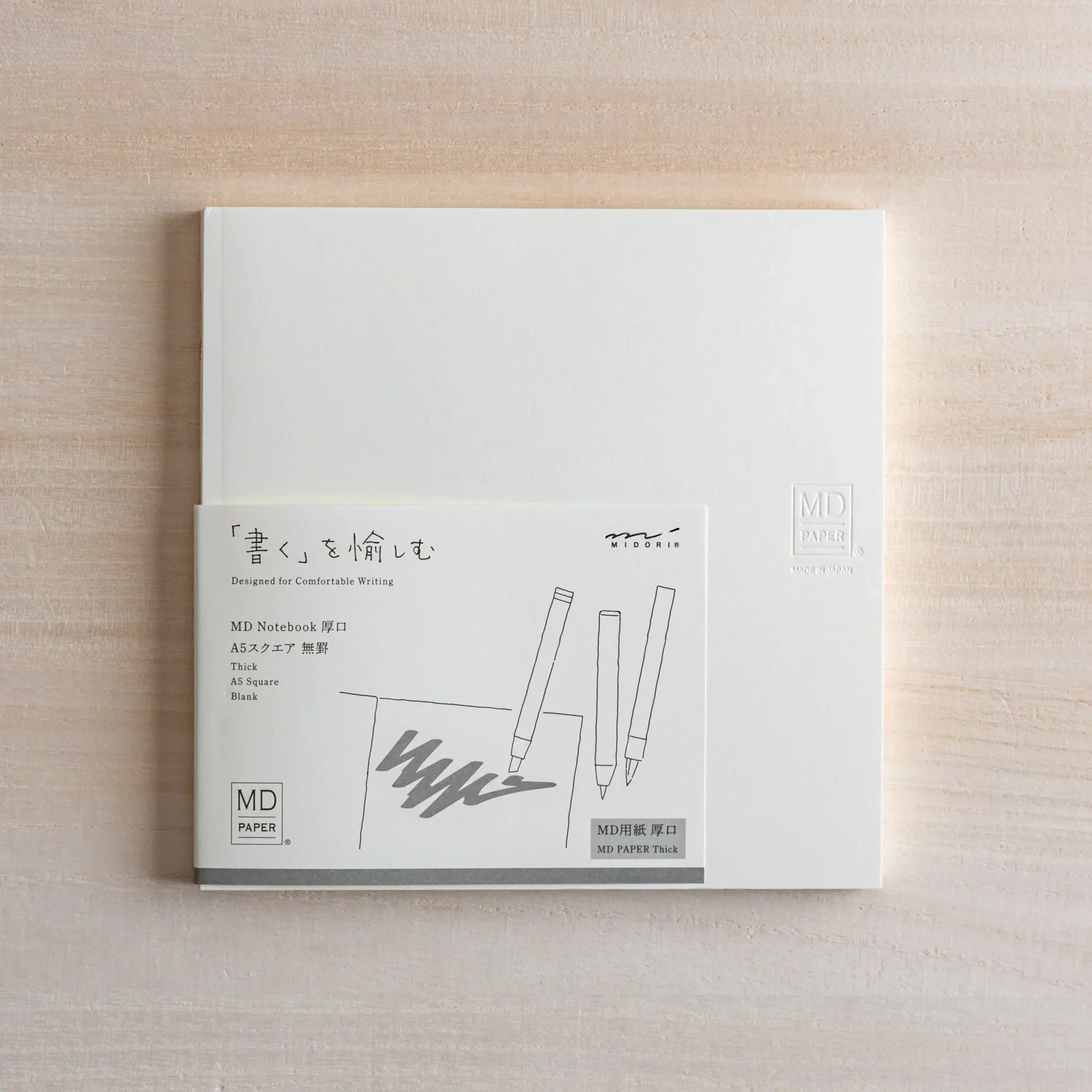 Midori MD A5 square grid thick paper notebook, closed front cover, Japanese Midori MD notebook with smooth cream-colored